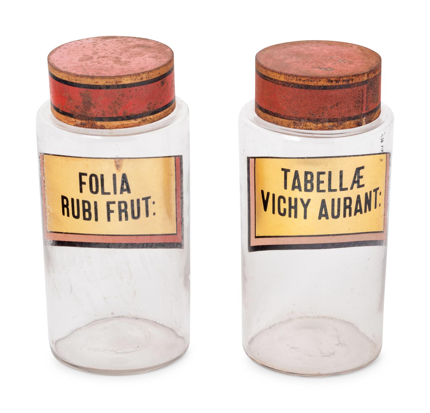 A Pair of Clear Glass Apothecary Jars