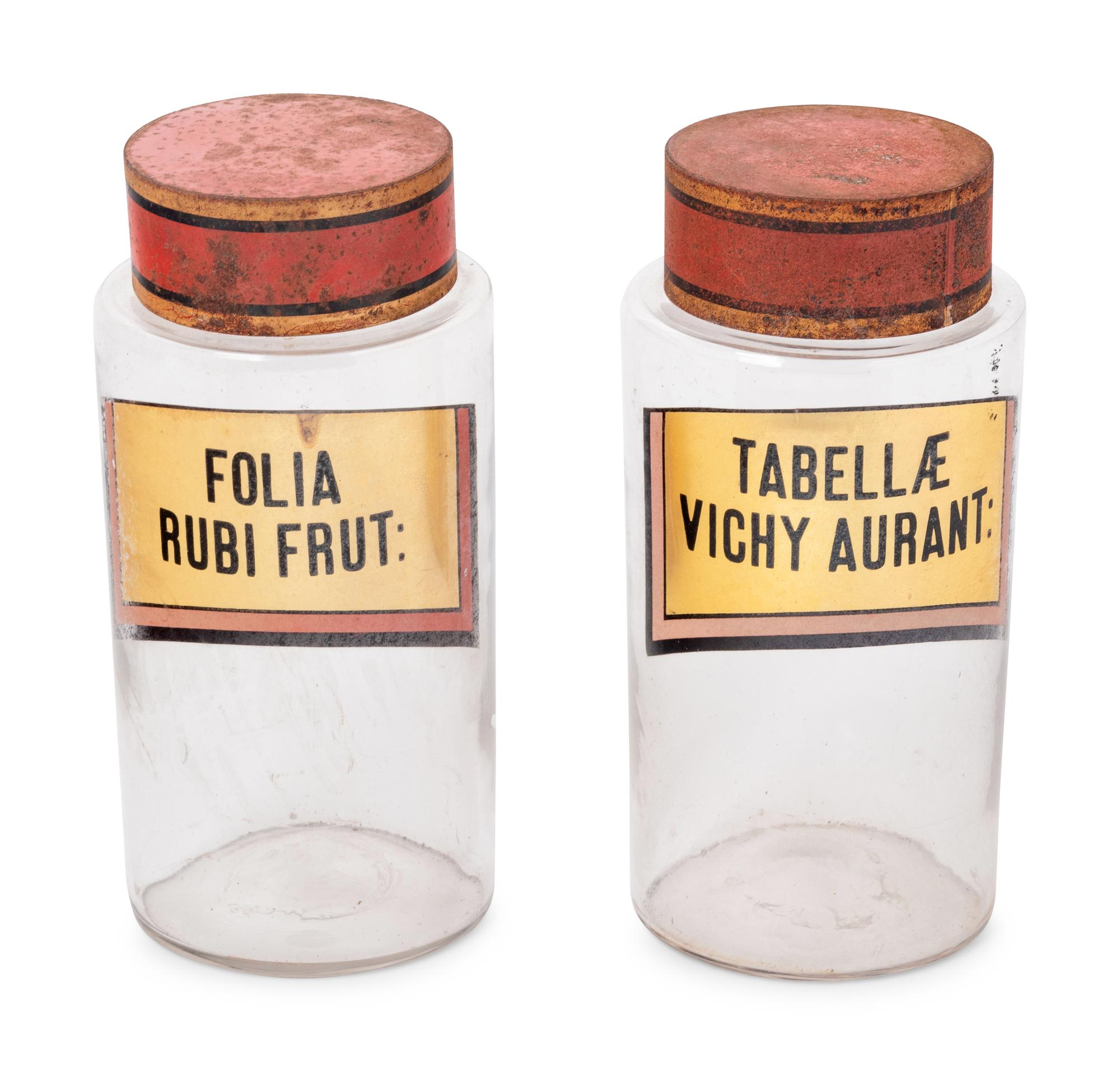 A Pair of Clear Glass Apothecary Jars