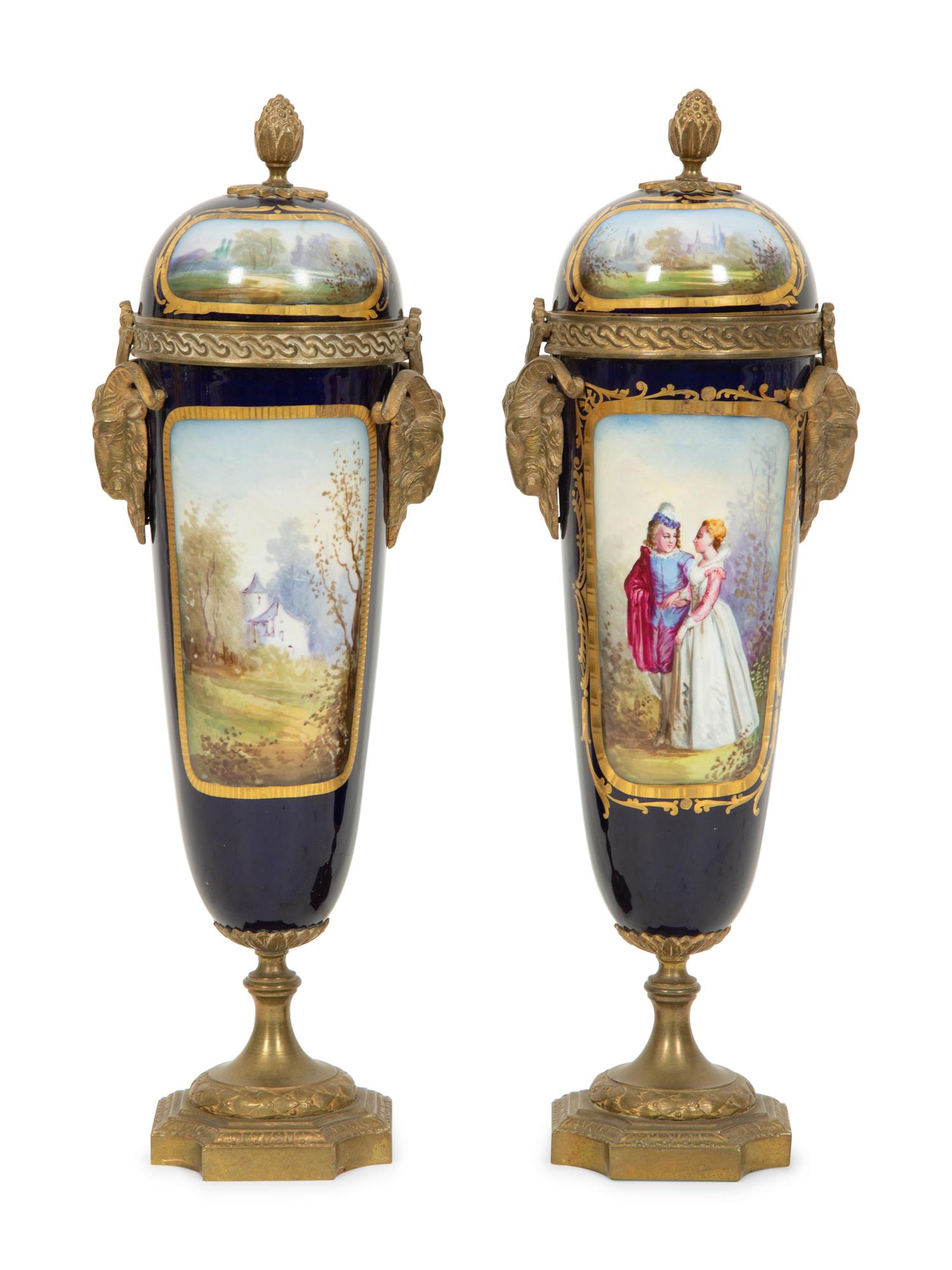 A Pair of Gilt Bronze Mounted Sevres Style Porcelain Urns