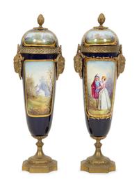 A Pair of Gilt Bronze Mounted Sevres Style Porcelain Urns