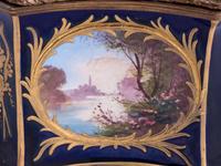 A Sèvres Style Painted and Parcel Gilt Porcelain Table Casket