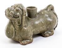 A Celadon Glazed Candle Holder Height 4 x width 7 1/4 inches.