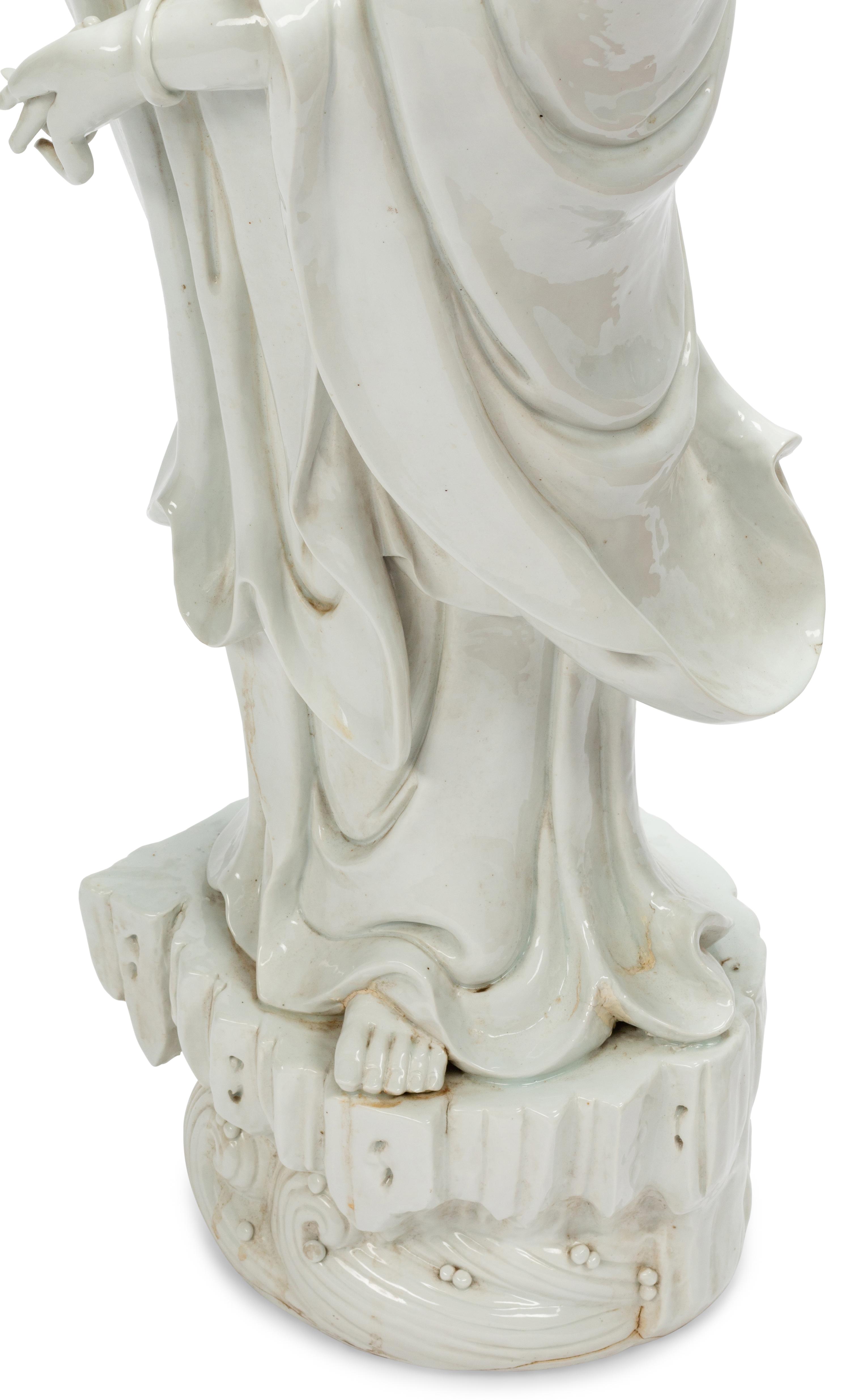 A Large Chinese Export White Glazed Porcelain Figure of Guanyin