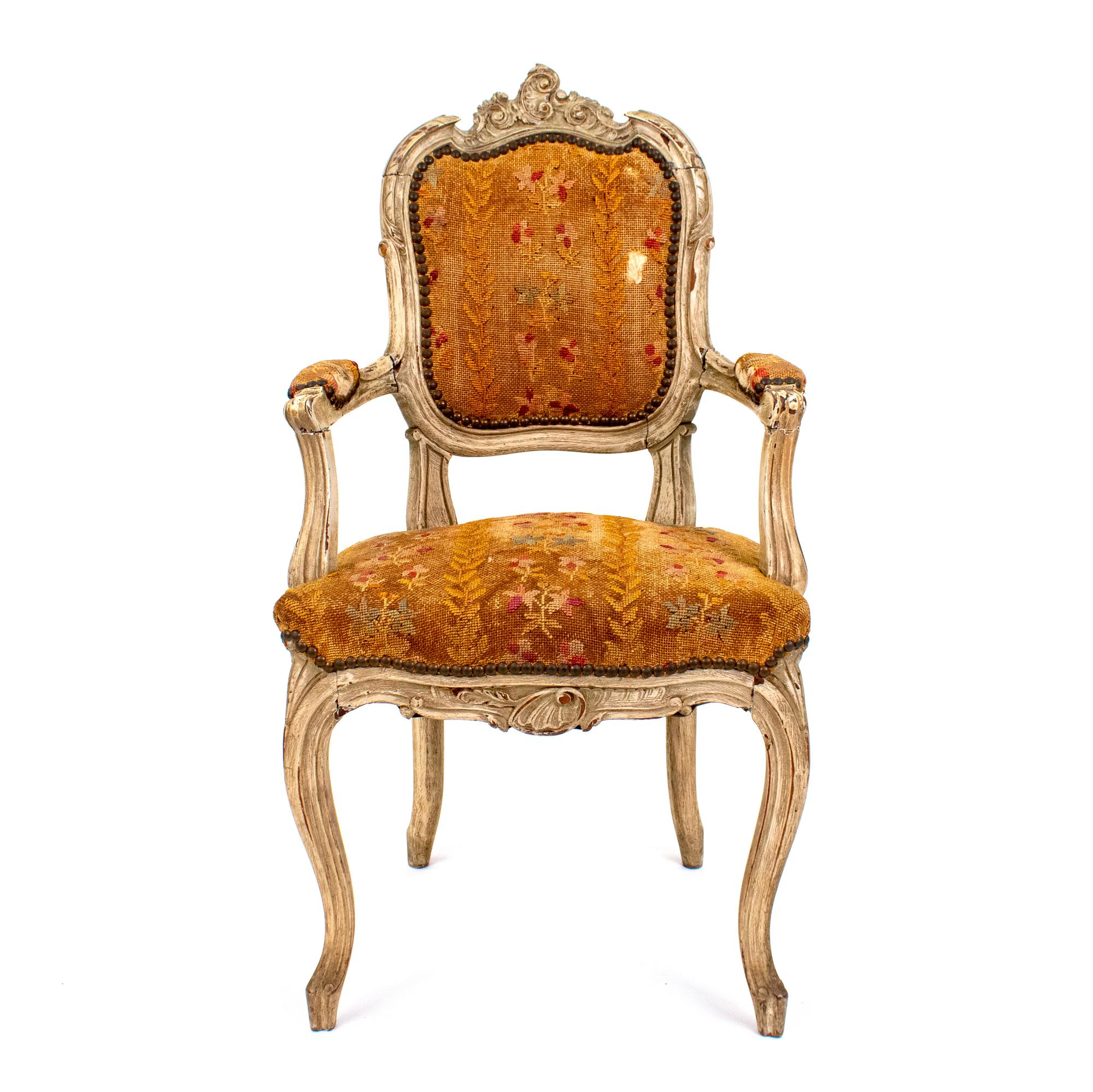 A Louis XV Style Carved Diminutive Fauteuil — LATE 18TH / EARLY 19TH CENTURY