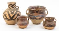 A Group of Six Neolithic Style Pottery Vessels Height of tallest 10 1/4 inches.