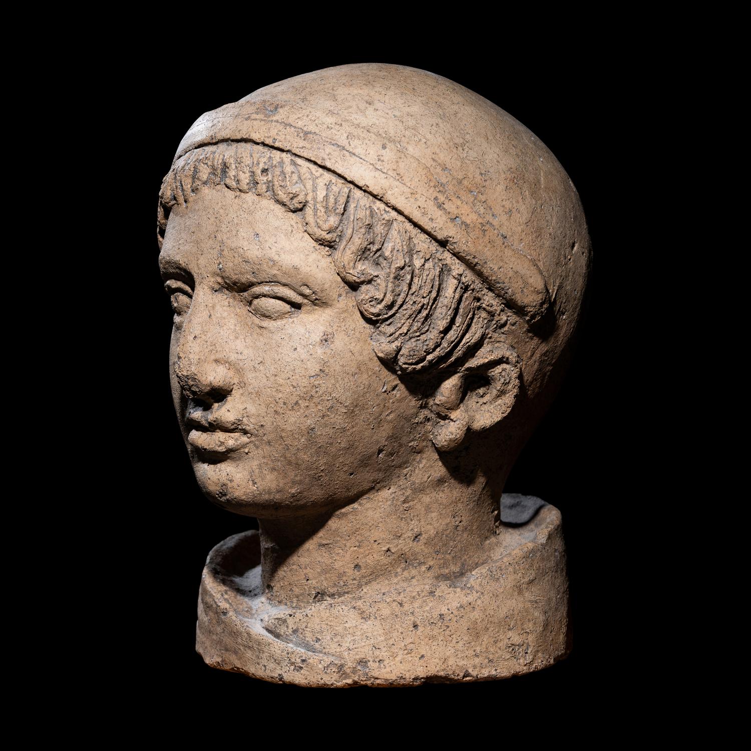 An Etruscan Terracotta Head of a Youth