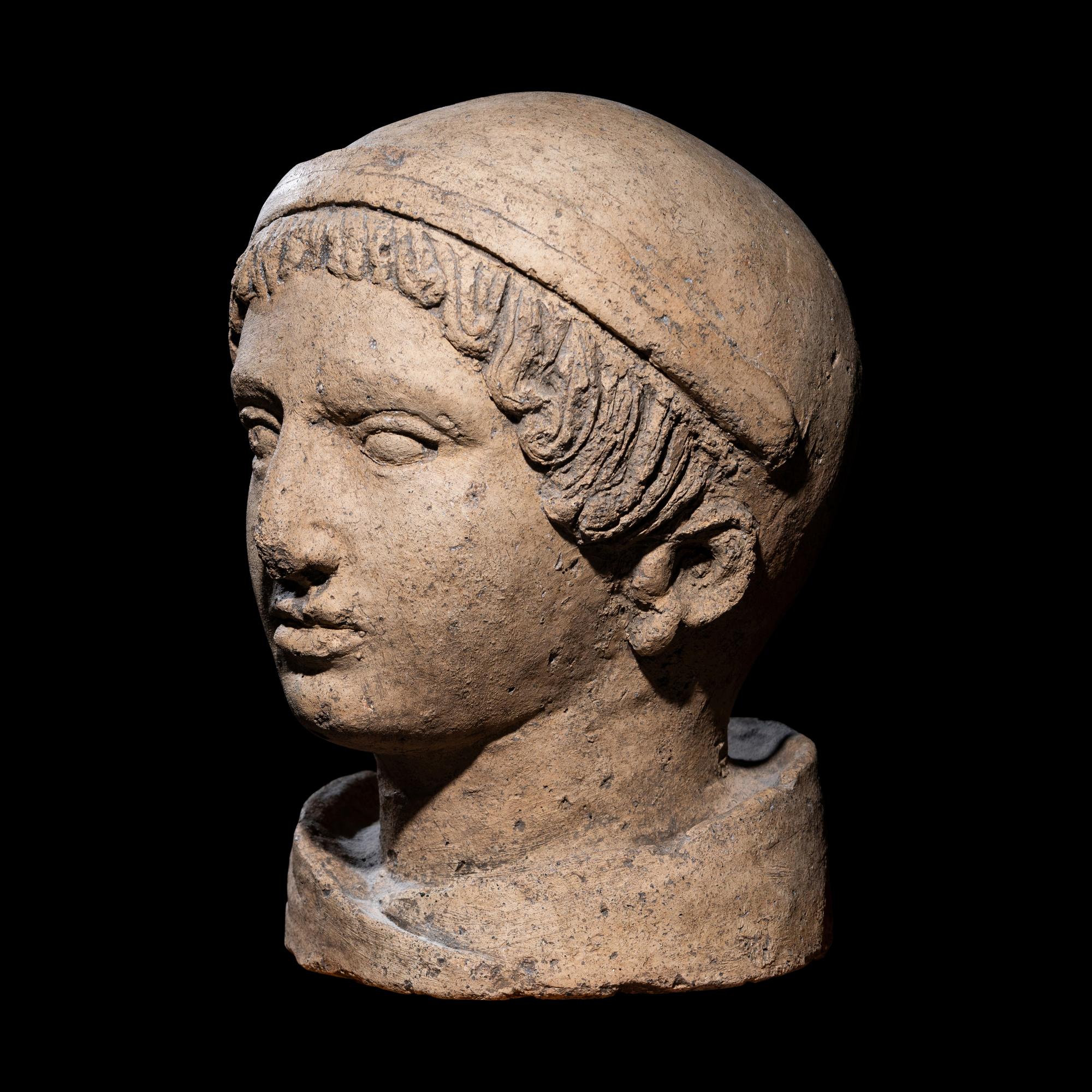 An Etruscan Terracotta Head of a Youth
