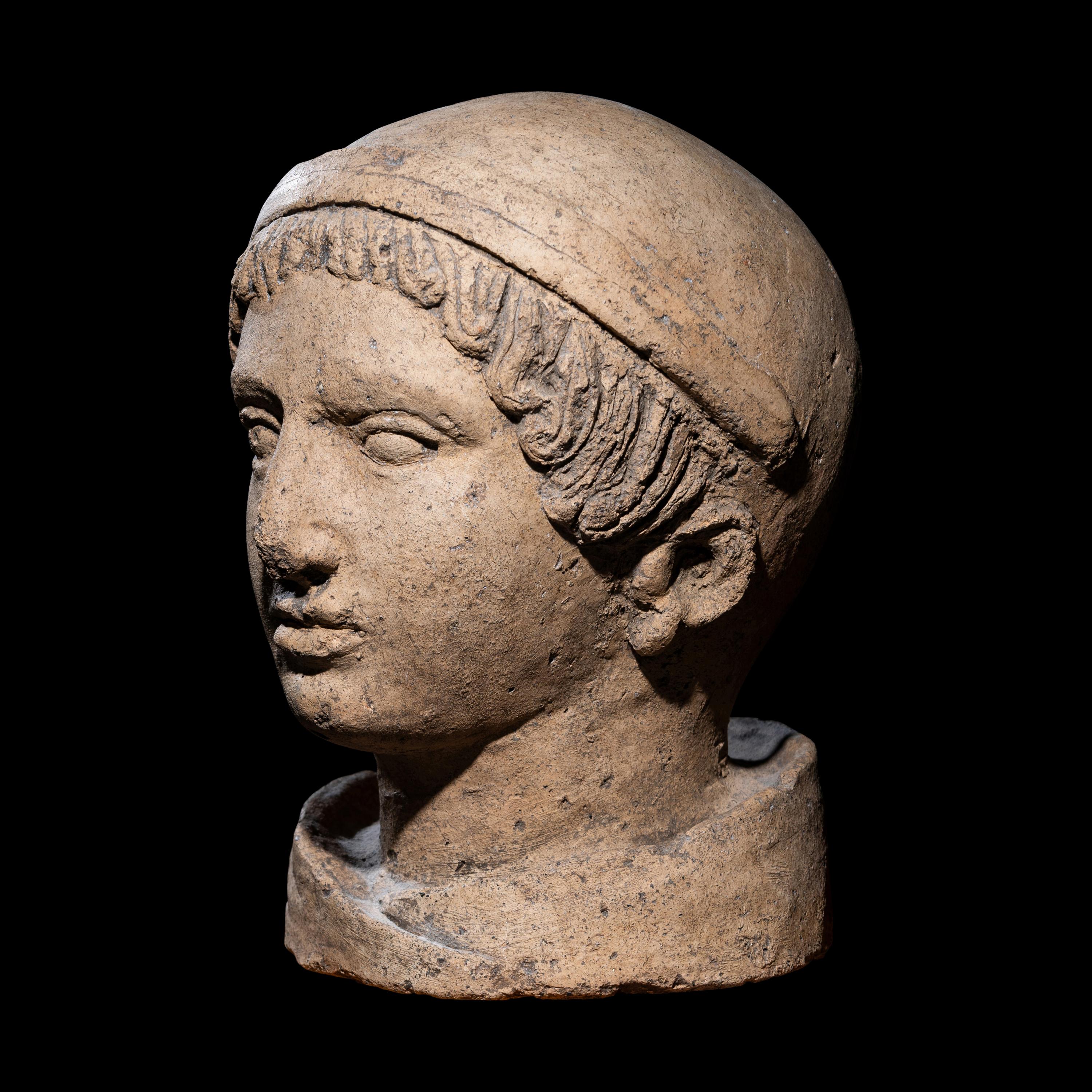 An Etruscan Terracotta Head of a Youth