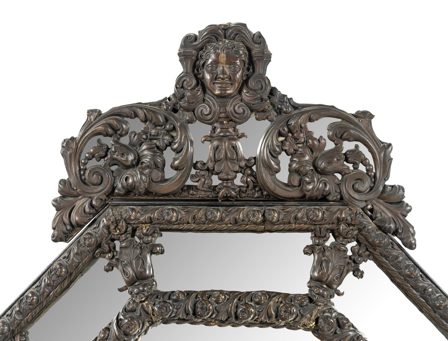 A Dutch Baroque Style Pressed Brass Mirror