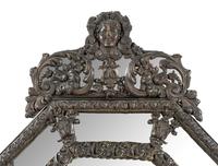 A Dutch Baroque Style Pressed Brass Mirror