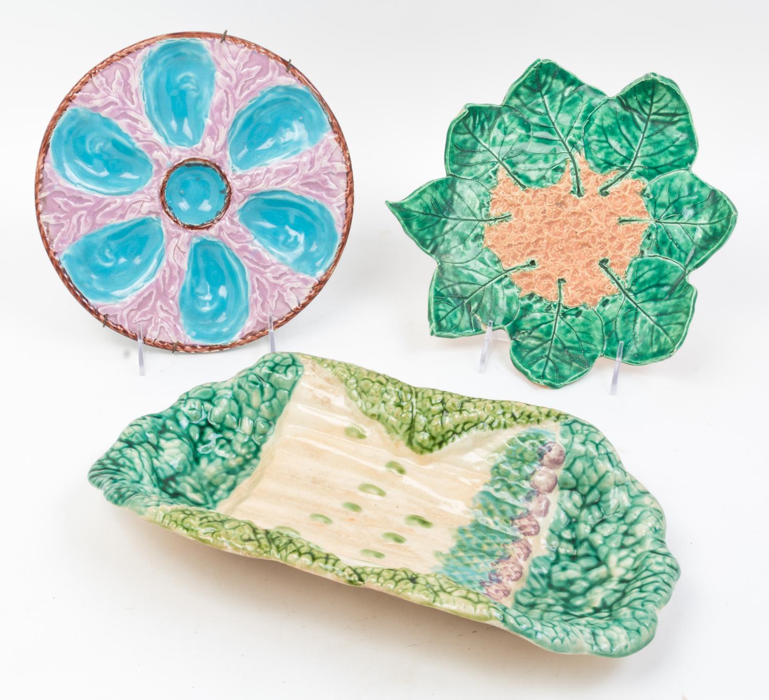 A Collection of Majolica Serving Dishes Length of longest 13 1/2 inches.