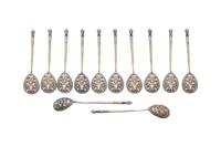 A Set of Twelve Russian Gilt-Washed Silver and Cloisonné Enamel Coffee Spoons