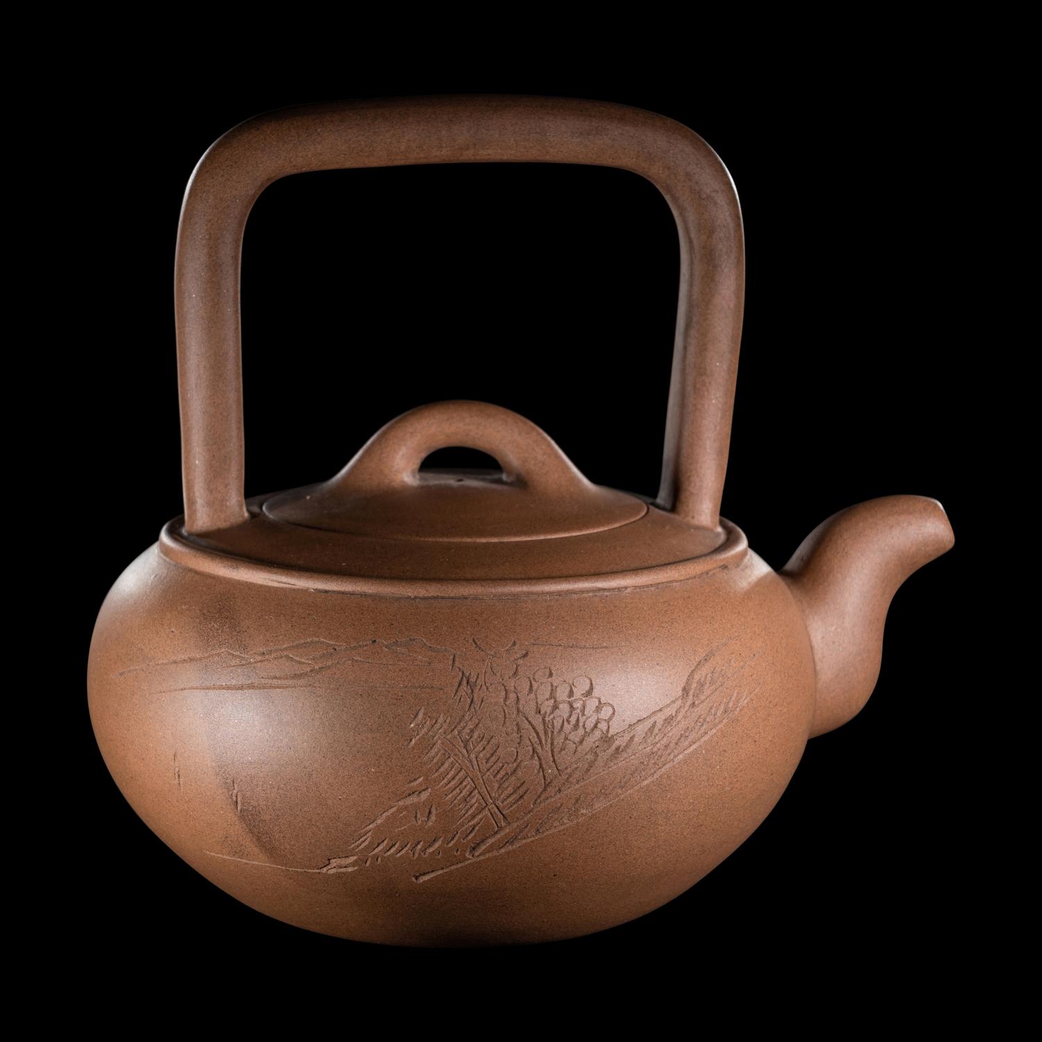 A Chinese Yixing Zisha Pottery Teapot