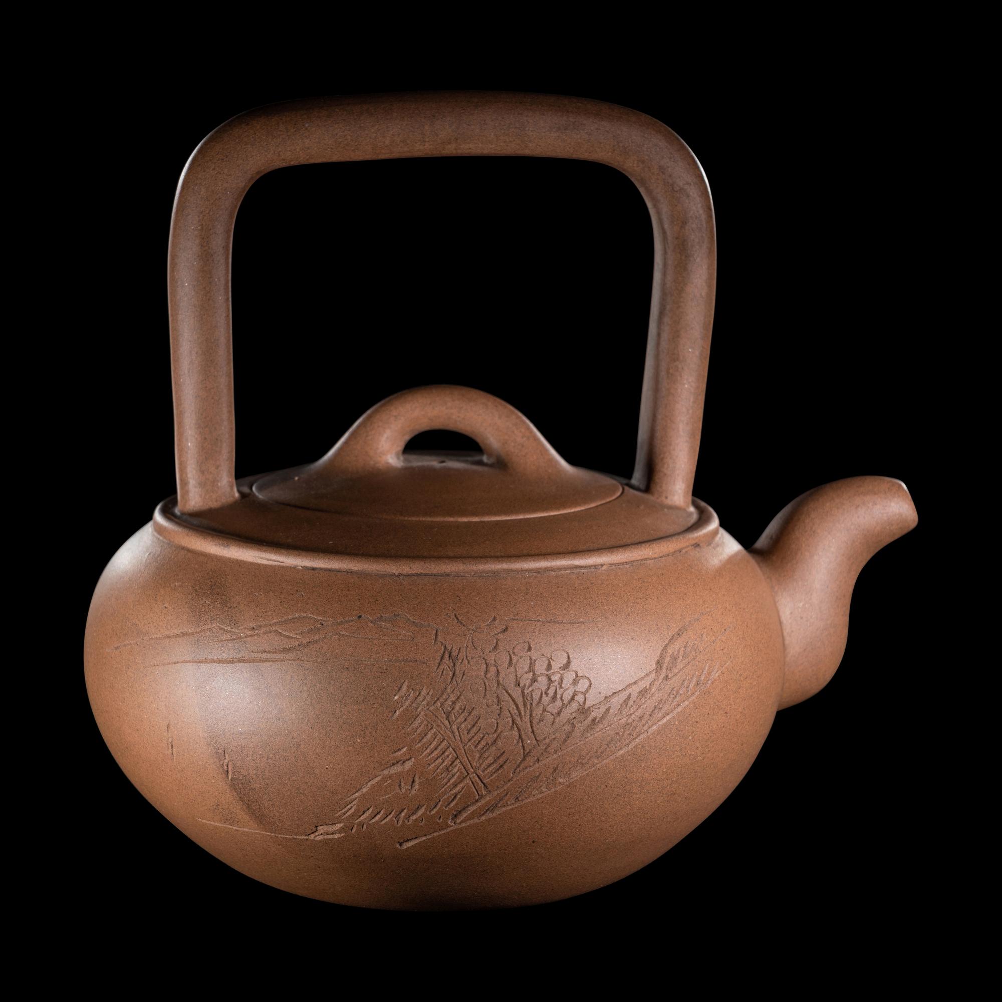 A Chinese Yixing Zisha Pottery Teapot