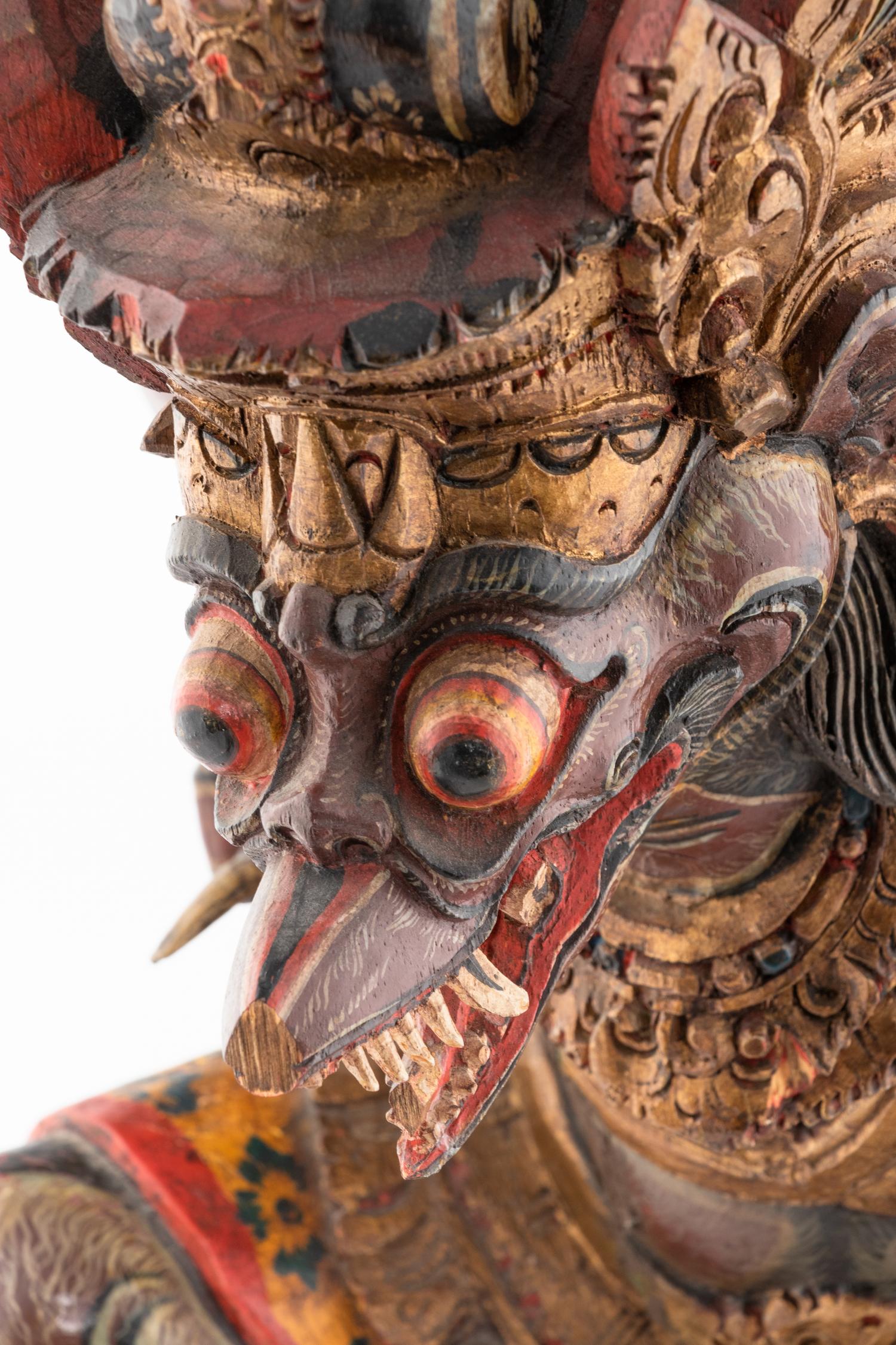 An Indian Carved and Polychrome Painted Wood Garuda Figure