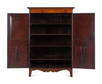A Regency Mahogany Armoire Simulating a Linen Press
