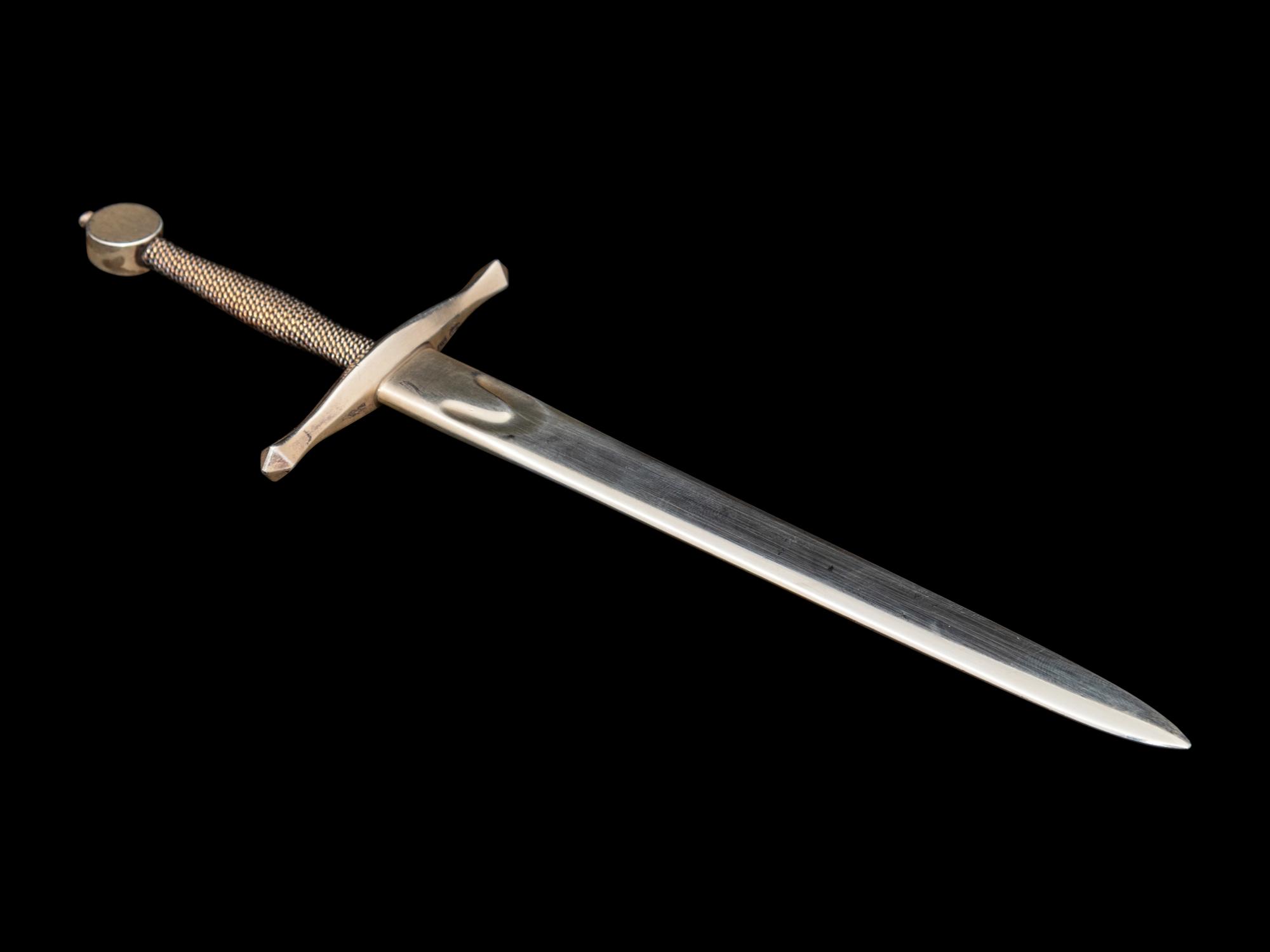A Steuben Excalibur Silver and Glass Paperweight