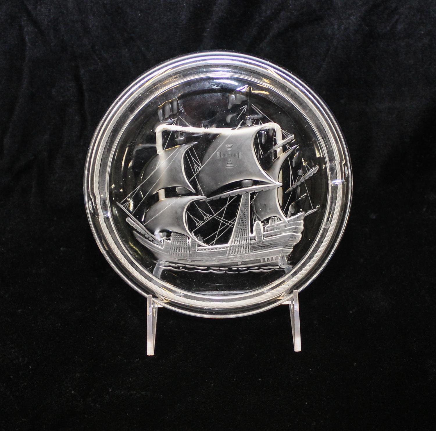 Lalique, a molded and frosted glass ash receiver, decorated with a ship