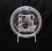 Lalique, a molded and frosted glass ash receiver, decorated with a ship