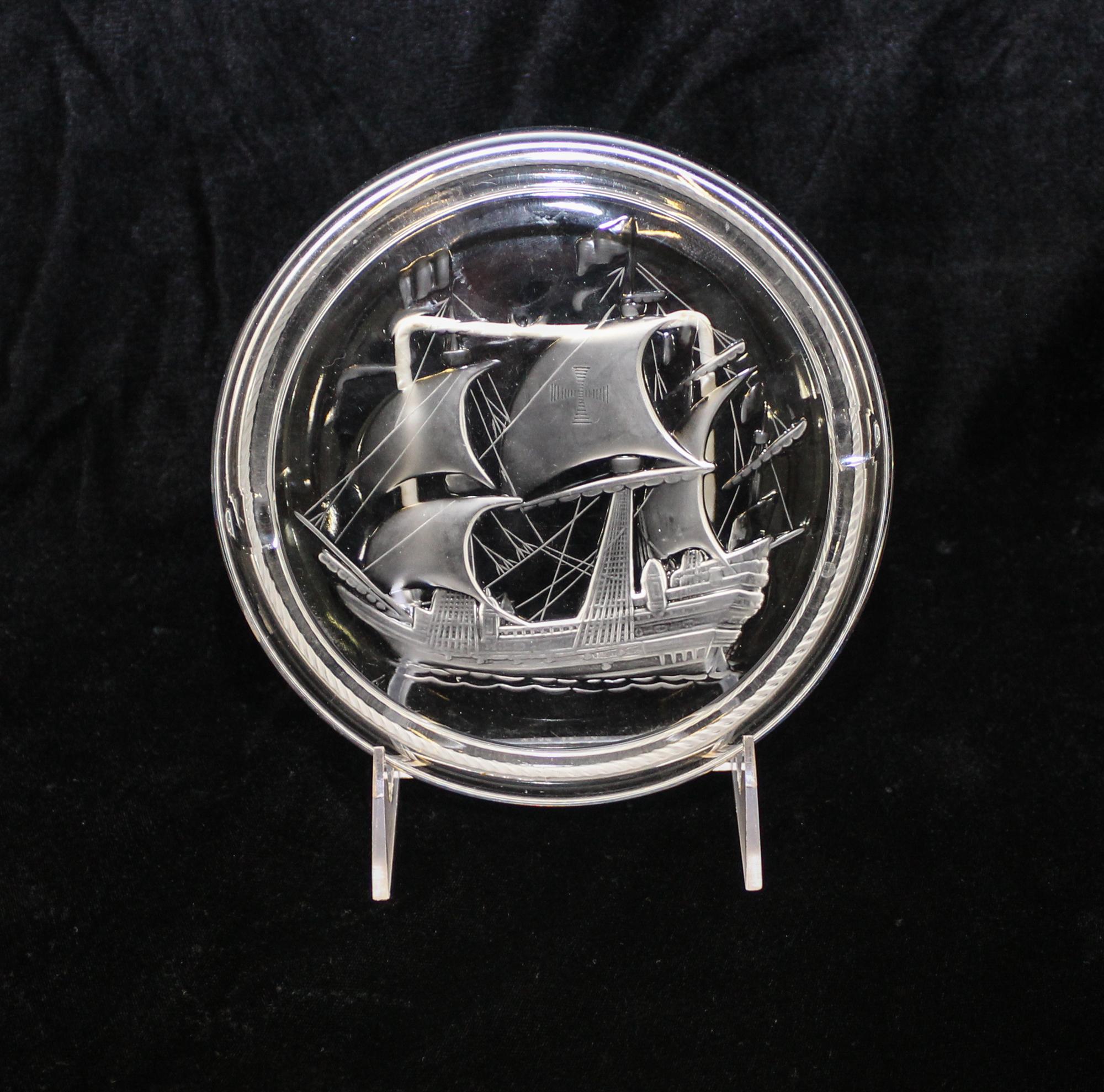 Lalique, a molded and frosted glass ash receiver, decorated with a ship