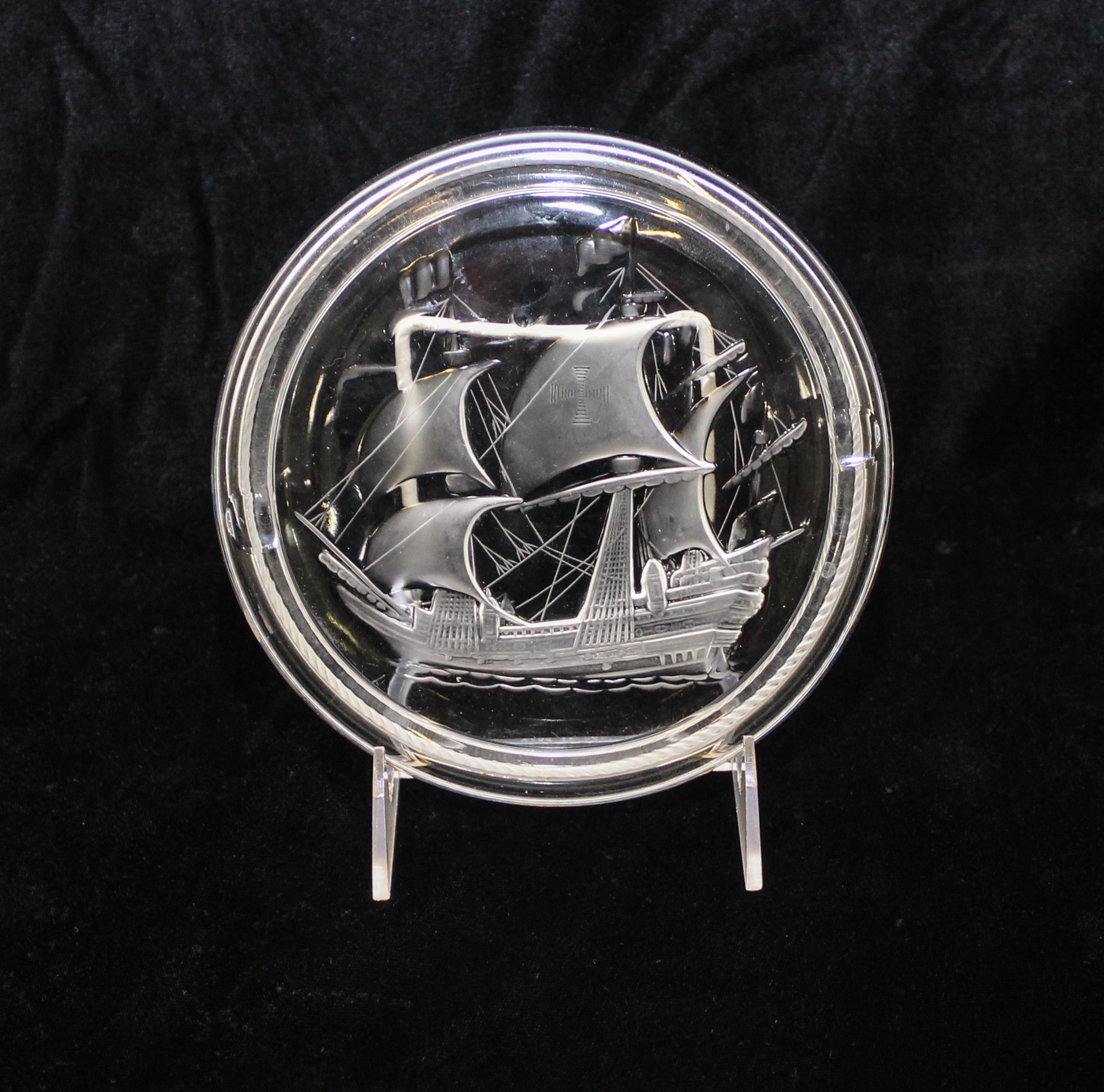 Lalique, a molded and frosted glass ash receiver, decorated with a ship