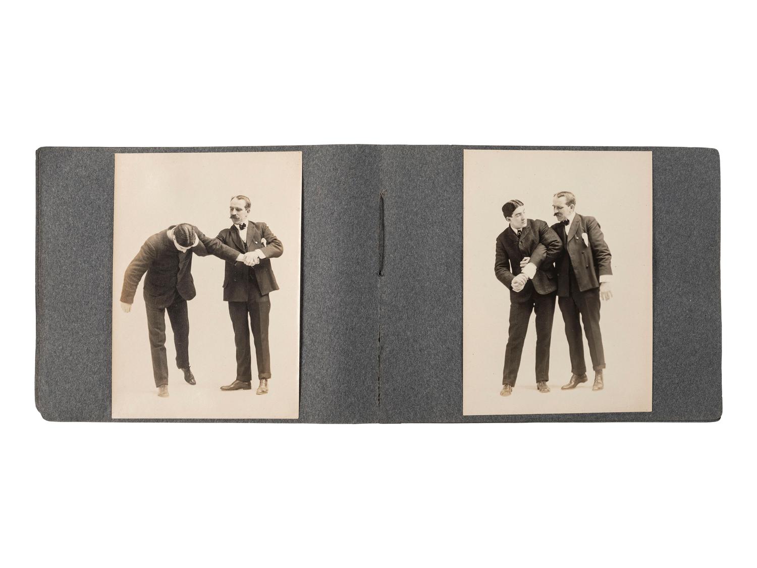 [EARLY PHOTOGRAPHY]. Album containing 72 photographs of self-defense maneuvers. Ca 1895.