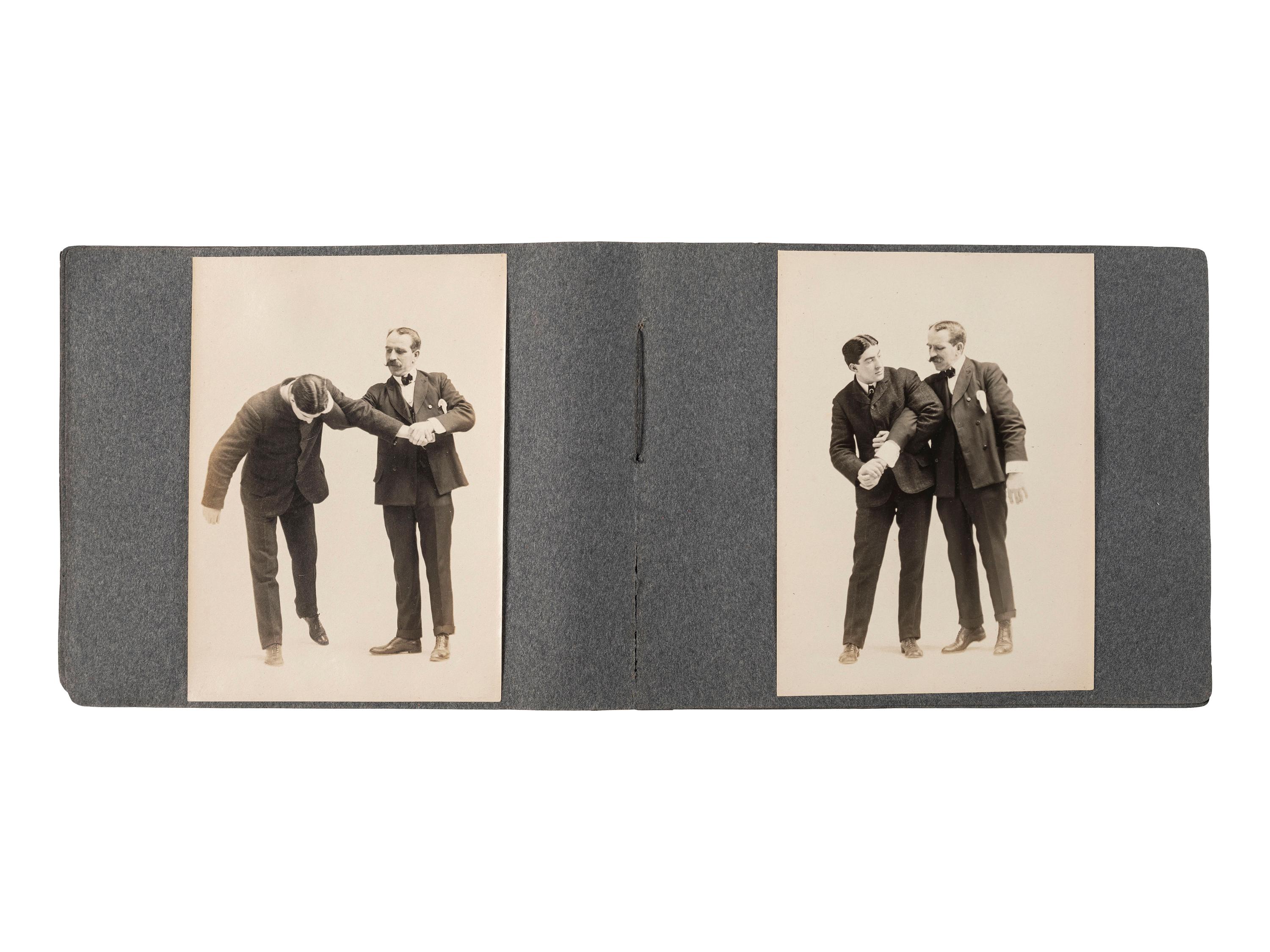 [EARLY PHOTOGRAPHY]. Album containing 72 photographs of self-defense maneuvers. Ca 1895.