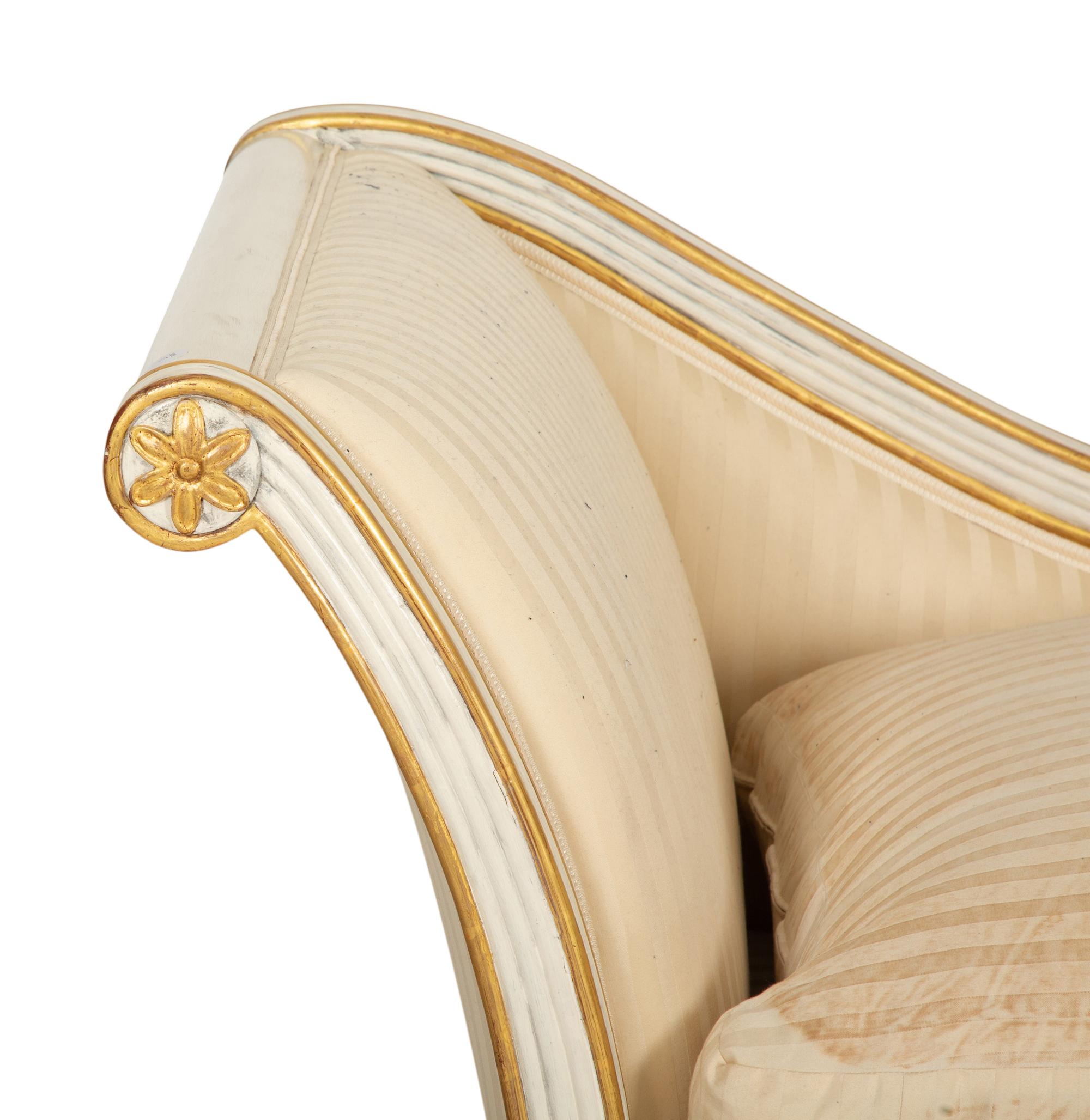 An Italian Painted and Parcel Gilt Chaise Lounge