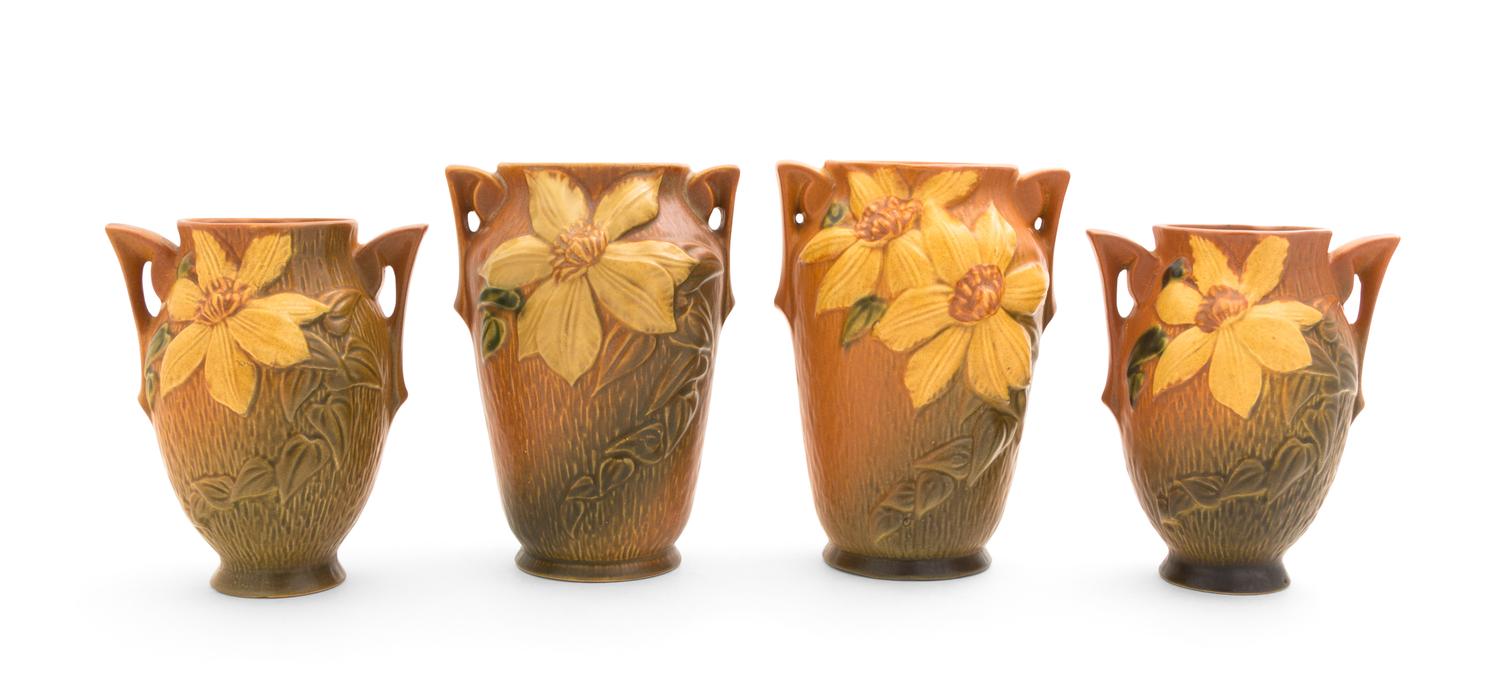 Two Pairs of Roseville Clematis Pottery Vases Height of first pair 7 1/4 inches, second 6 1/4 inches.