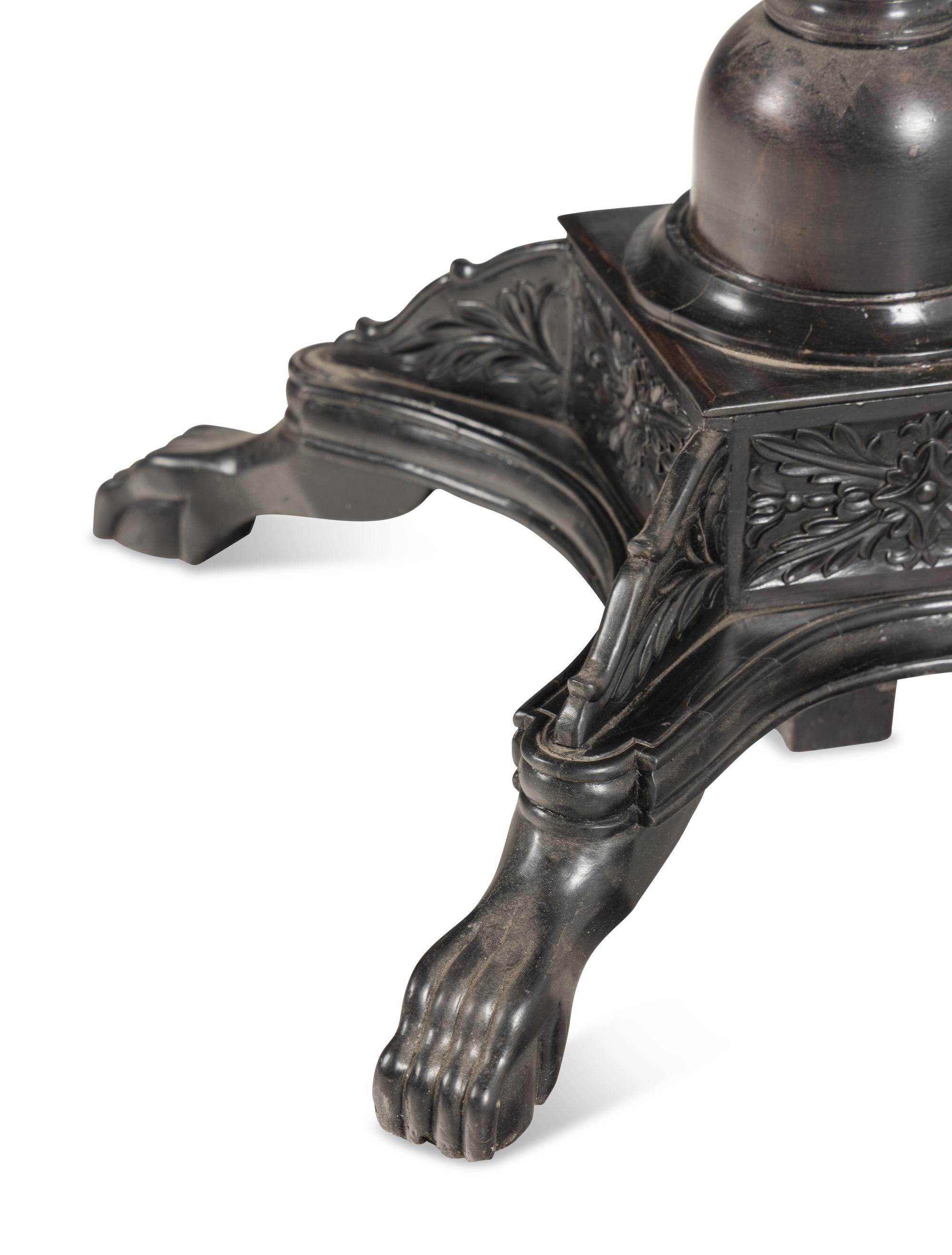 An Anglo-Indian Ebony and Specimen Wood Center Table