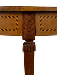 A Baltic Neoclassical Style Satinwood and Ebony Inlaid Center Table — EARLY 20TH CENTURY