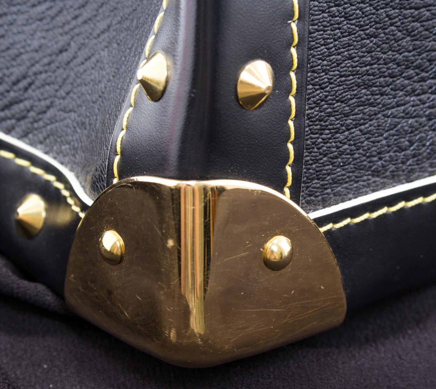 A Louis Vuitton Black Suhali Le Talentueux Handbag, 12.25" x 7" x 3.5".