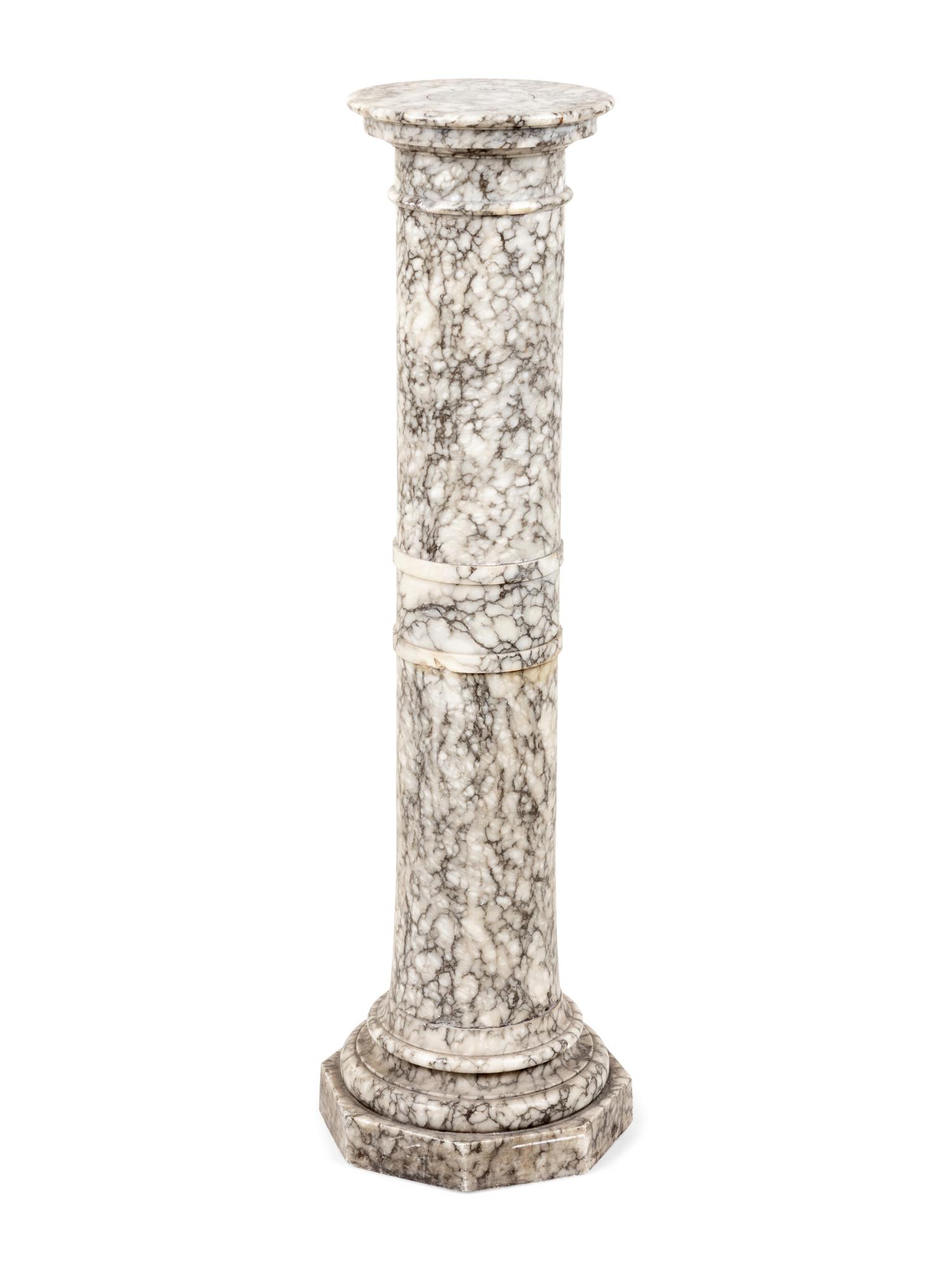 A Continental Carved Marble Pedestal