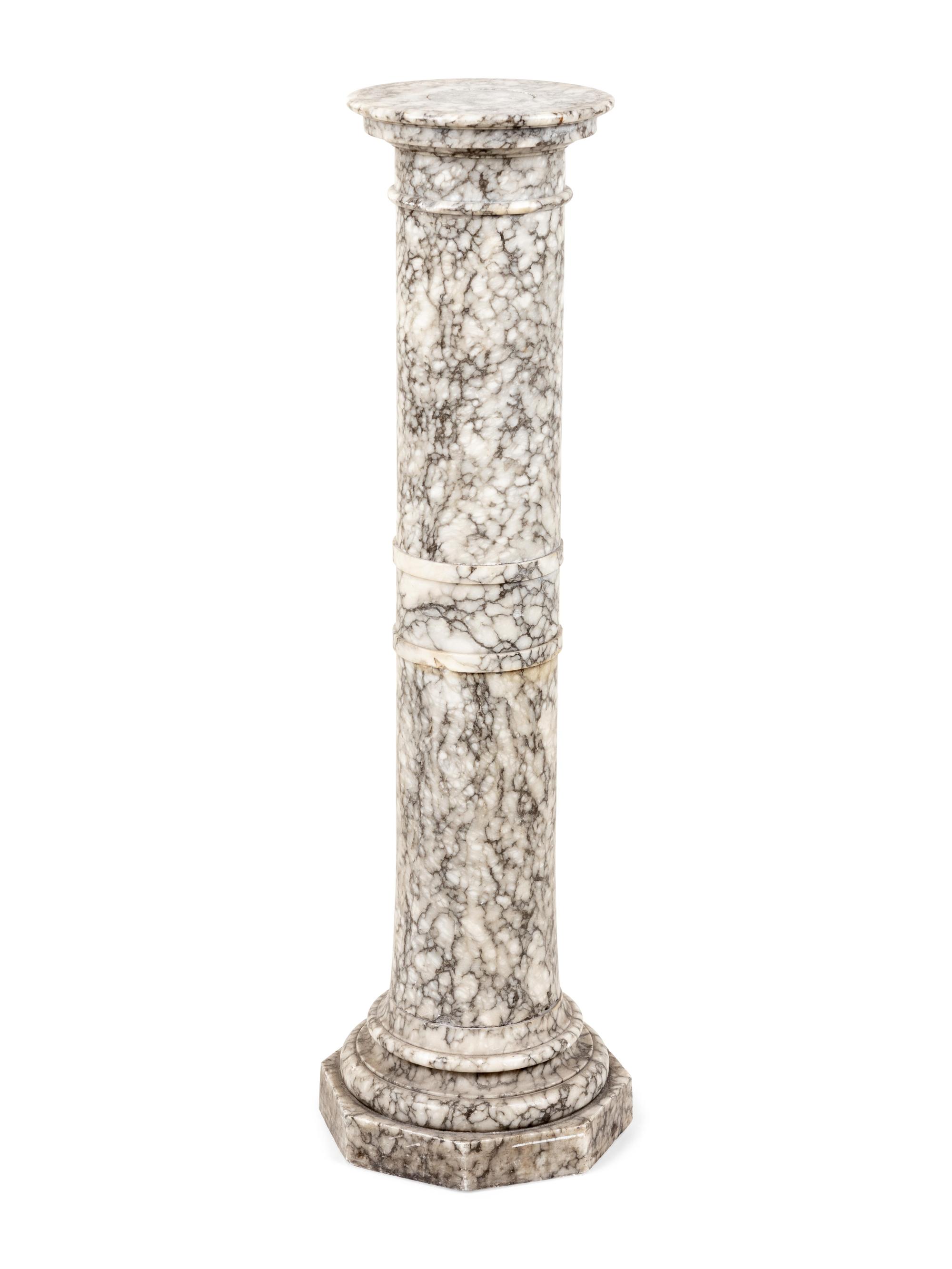 A Continental Carved Marble Pedestal