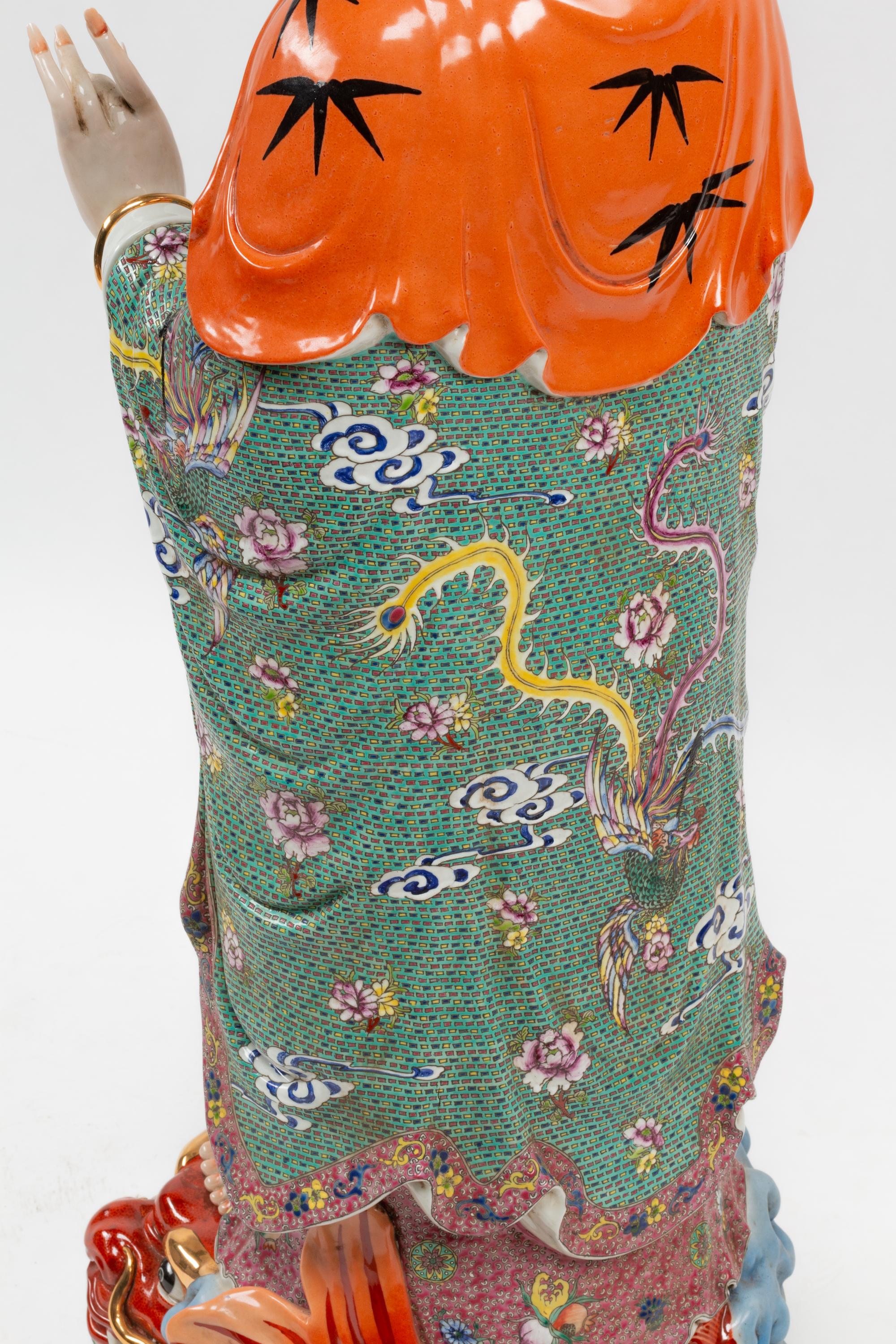 A Chinese Export Enameled Porcelain Figure of Guanyin