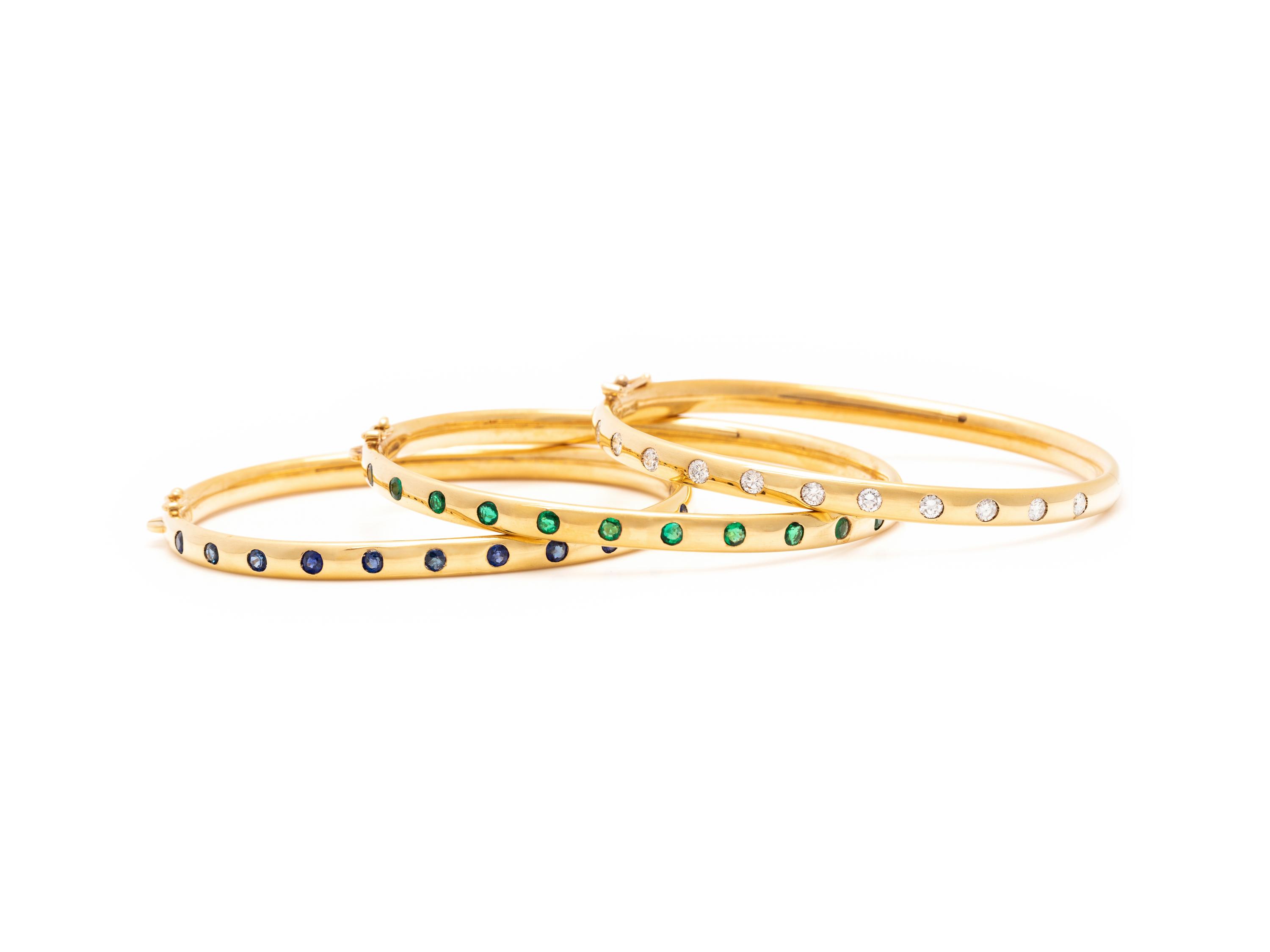 SCHLUGER, YELLOW GOLD, DIAMOND AND GEMSTONE BANGLE SET