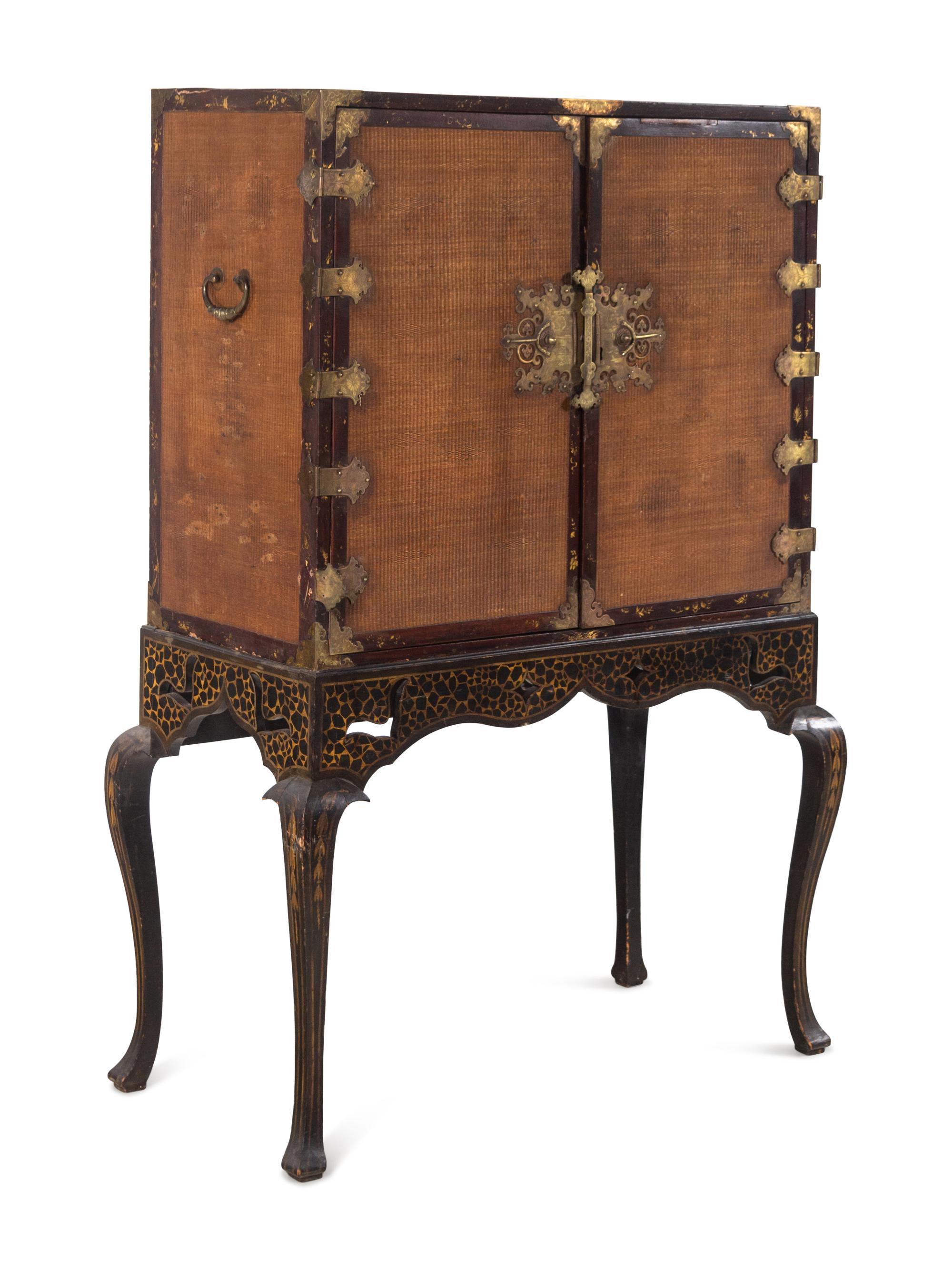 A Chinese Export Gilt Decorated Lacquer Cabinet on Stand