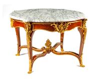 A Louis XV Style Gilt Bronze Mounted Center Table