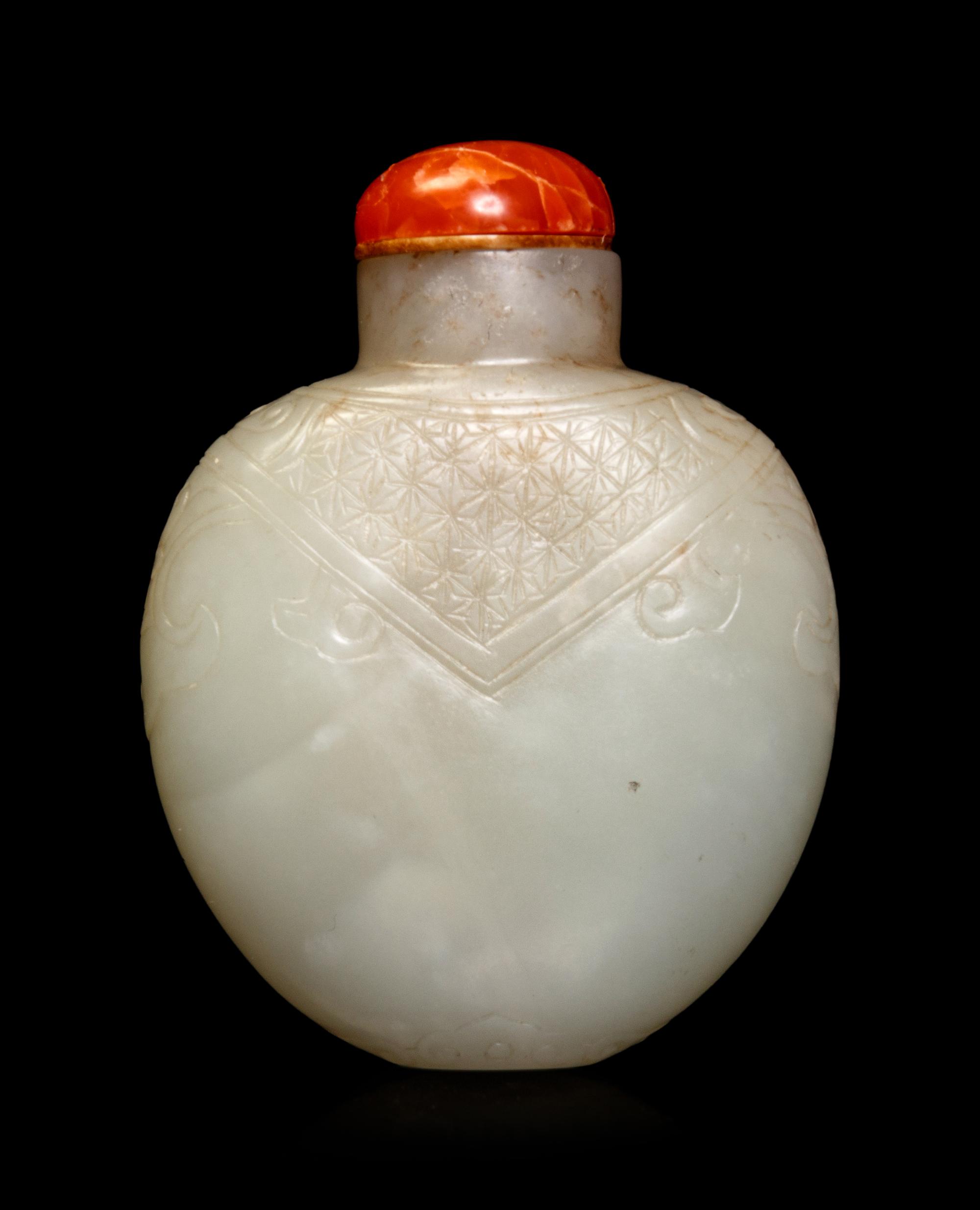 A Carved White Jade Snuff Bottle