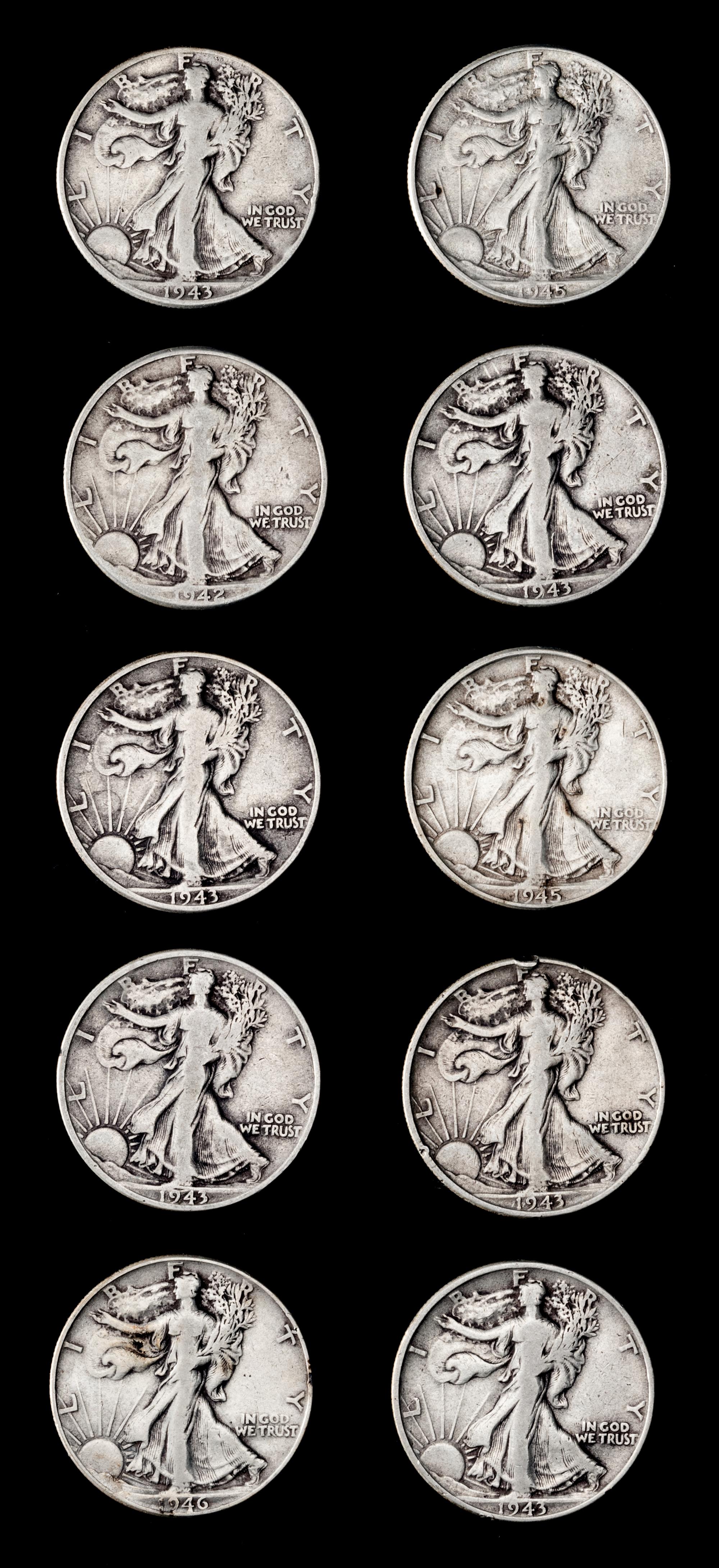 A Collection of Twenty-Eight United States Walking Liberty 50c Coins