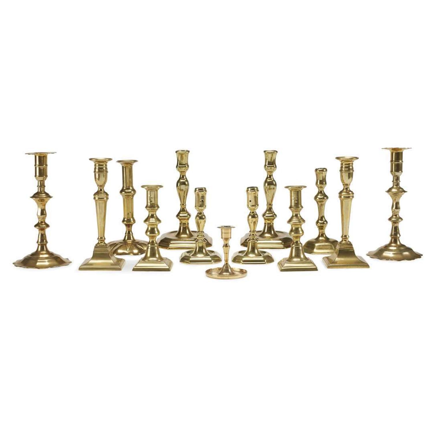 Group of fifteen brass candlesticks English and Dutch, 17th-19th century