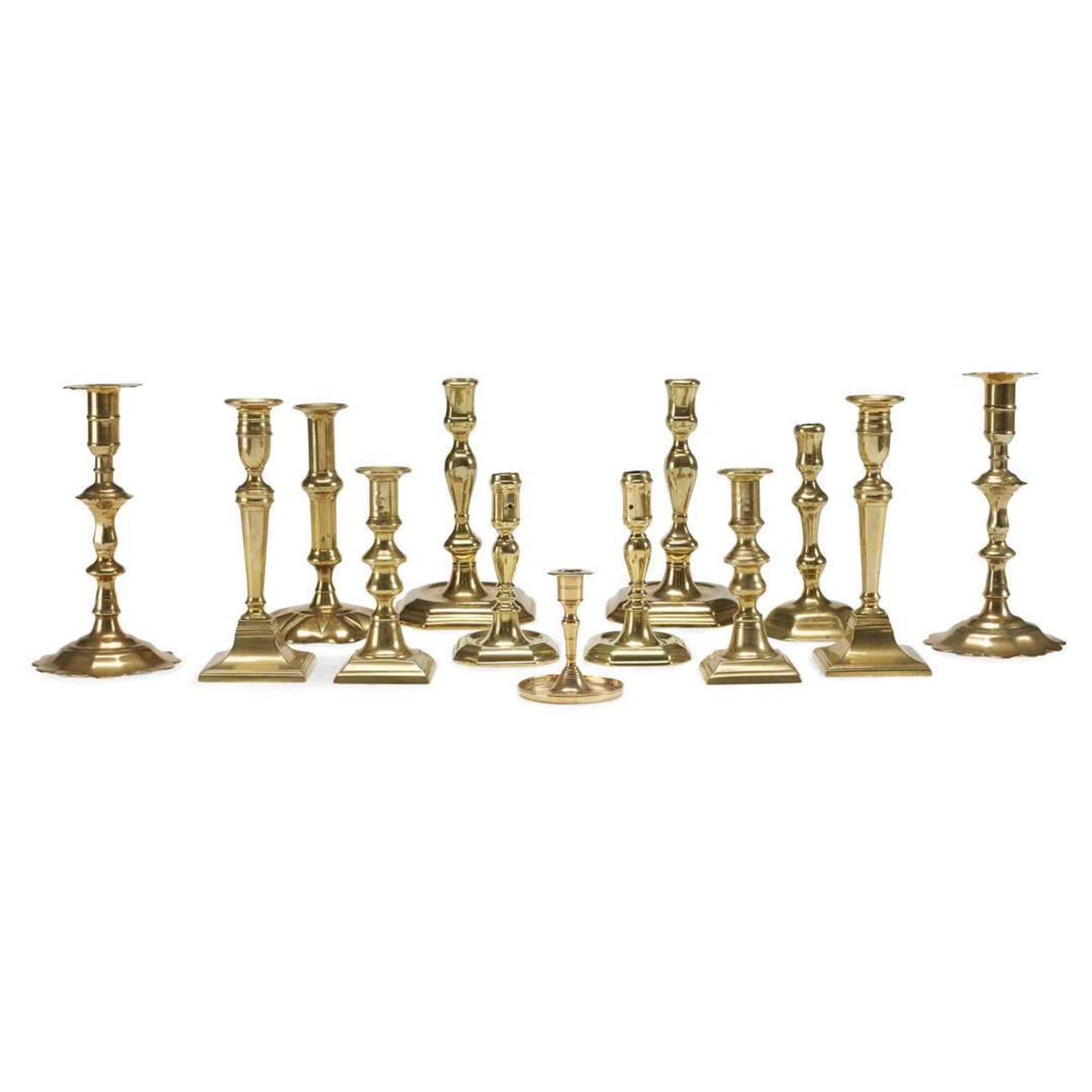 Group of fifteen brass candlesticks English and Dutch, 17th-19th century