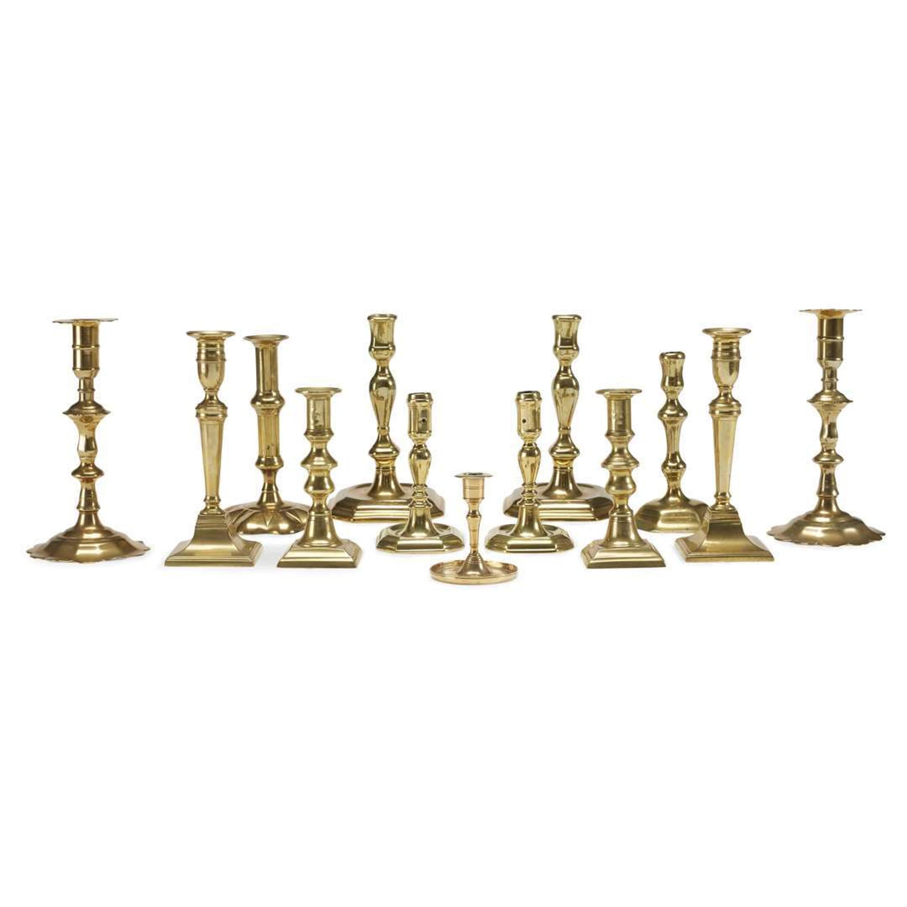 Group of fifteen brass candlesticks English and Dutch, 17th-19th century