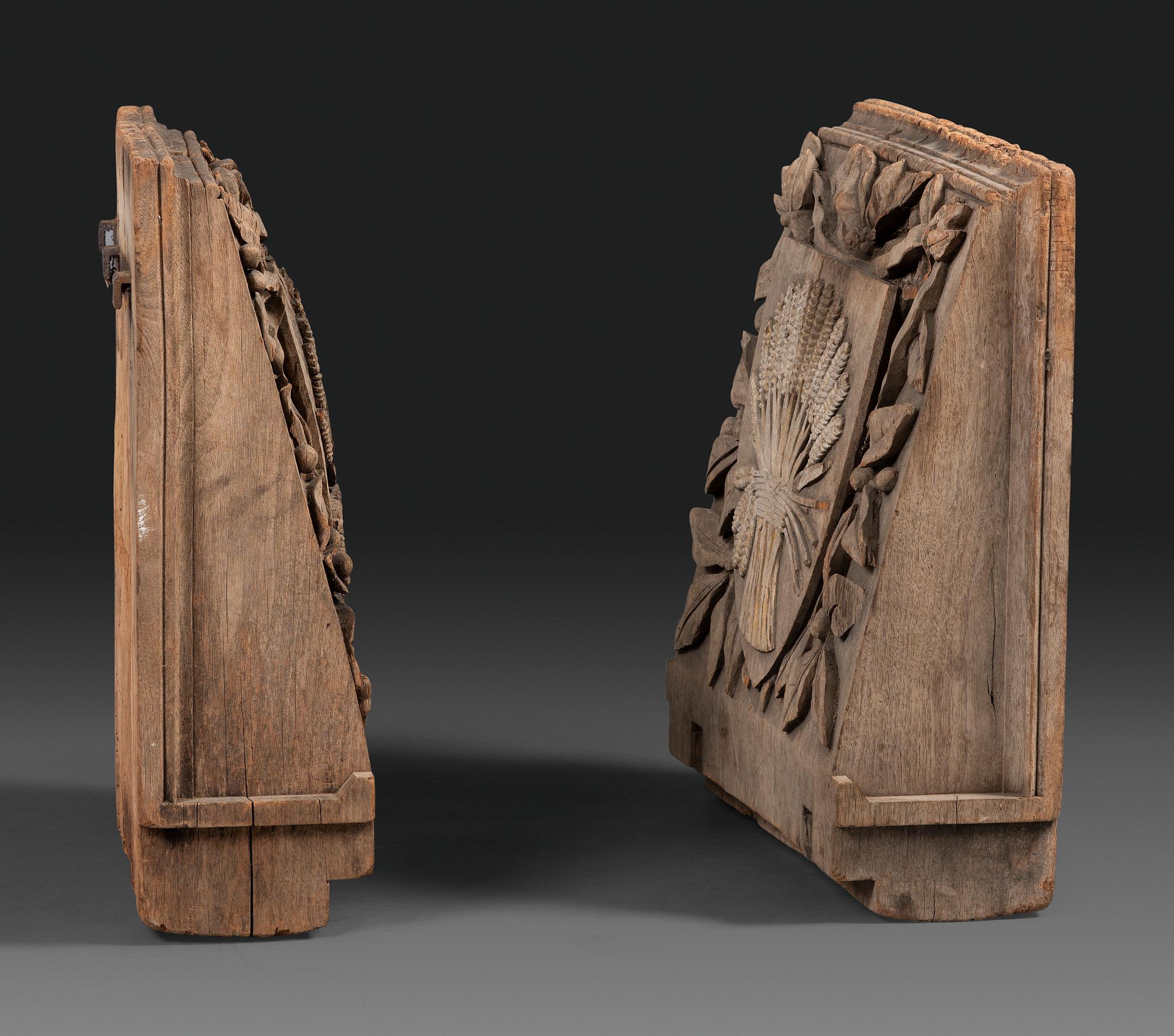 A Pair of English Carved Wood Baker's Shop Architectural Panels