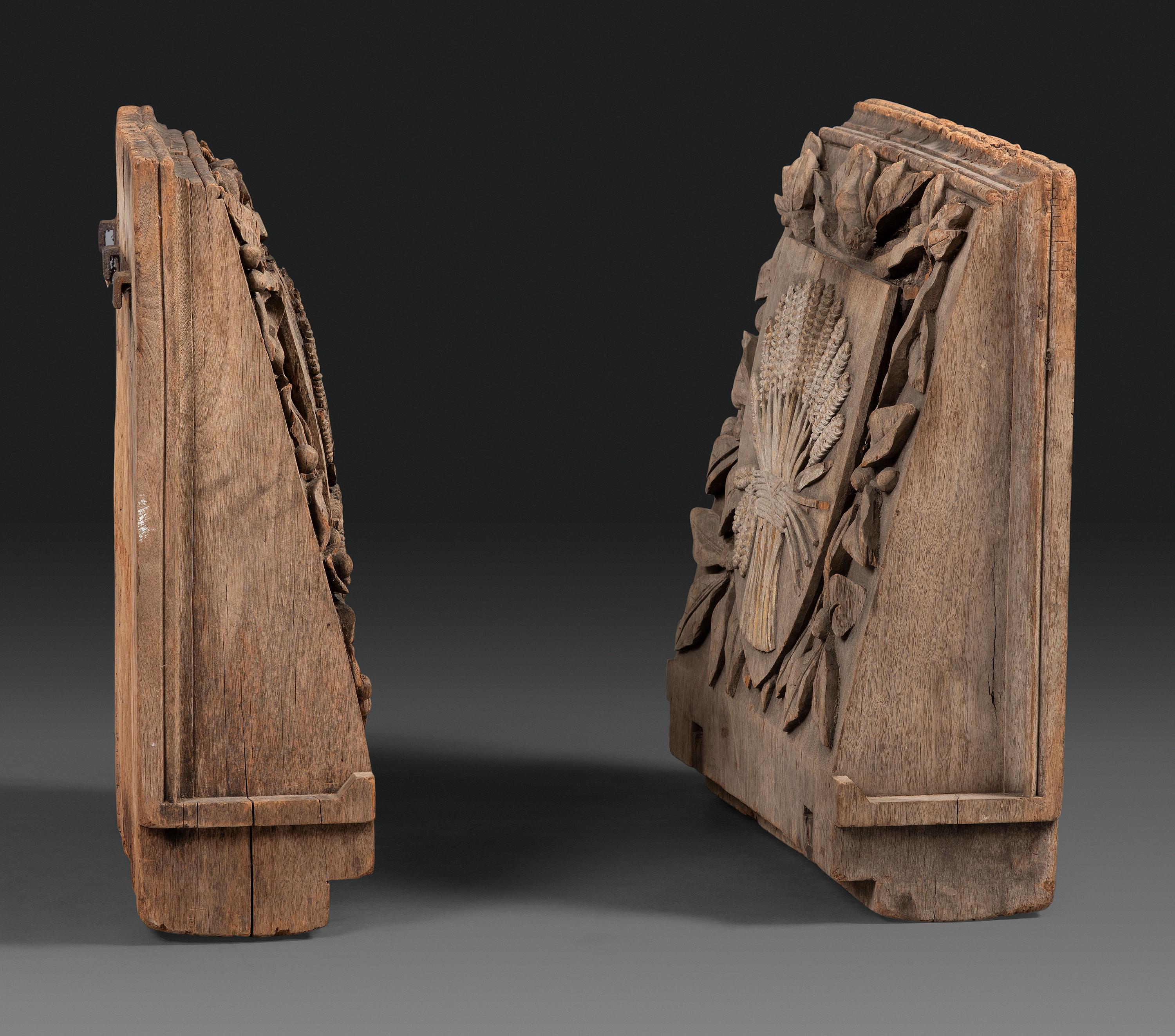 A Pair of English Carved Wood Baker's Shop Architectural Panels