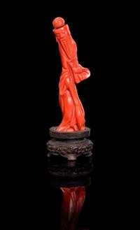 A Carved Red Coral Snuff Bottle Height overall 3 1/4 inches.