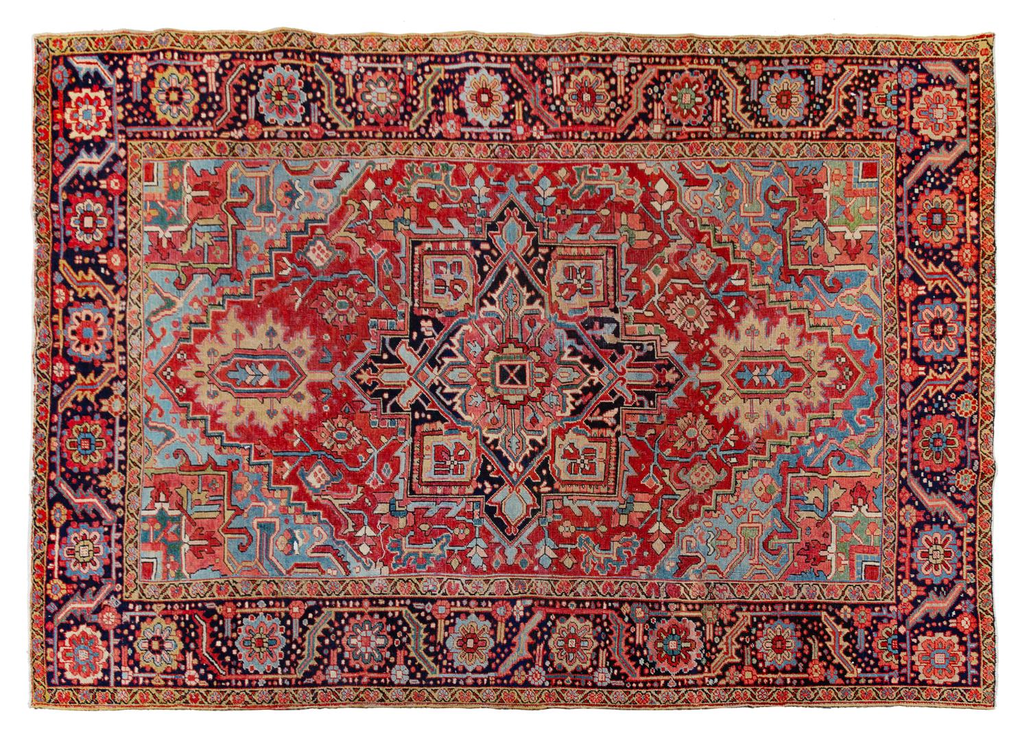 A Heriz Wool Rug 10 feet 8 inches x 7 feet 11 inches. — 20TH CENTURY