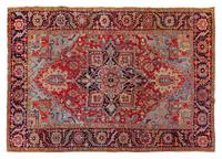 A Heriz Wool Rug 10 feet 8 inches x 7 feet 11 inches. — 20TH CENTURY