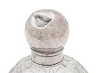 Four English Silver Mounted Cut Glass Bottles
