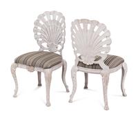 A Set of Four "Grotto" Style Cast Metal Chairs
